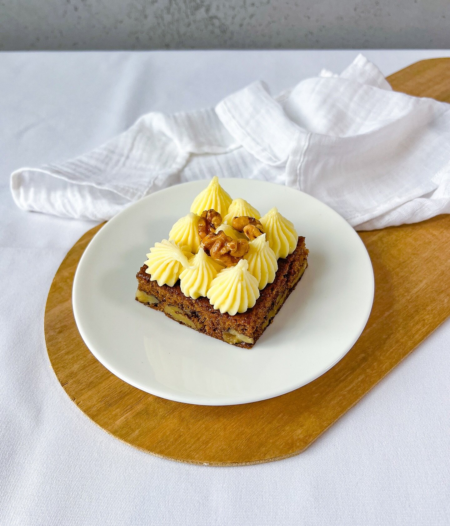 Treat yourself to our irresistible Carrot Cake this Easter! With its moist carrot and walnut base, luscious cream cheese icing, and caramelized walnut topping, it&rsquo;s the perfect sweet indulgence for the holiday season.
Enjoy a single slice, or g