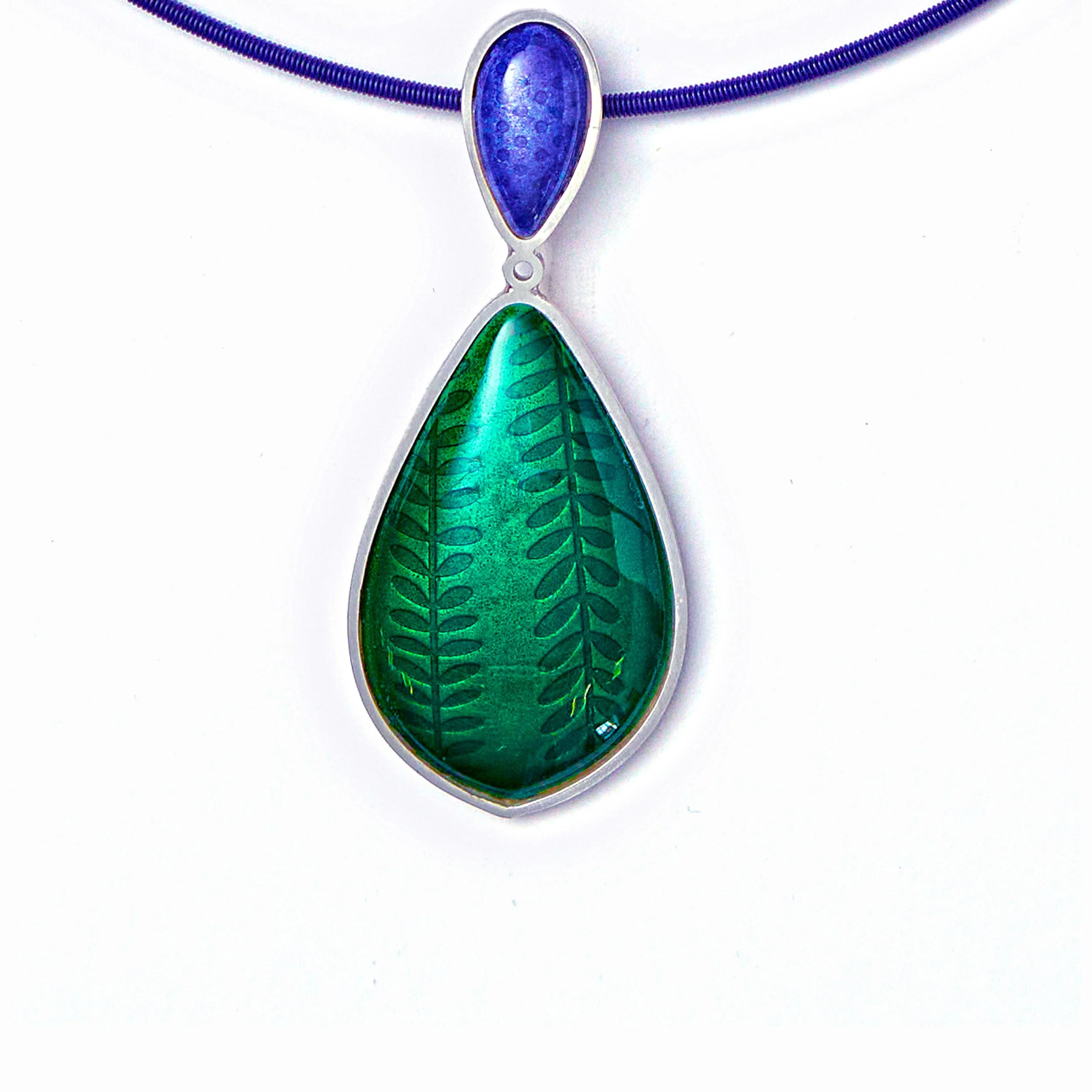Green teardrop pendant with purple top.jpg