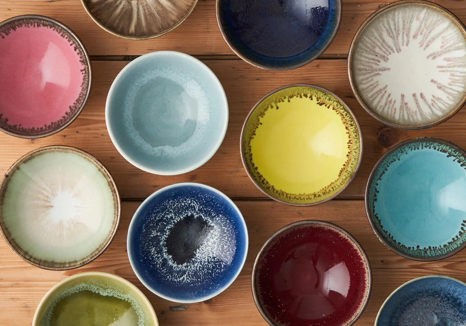 Multi colour small hand made wheel thrown porcelain bowl
