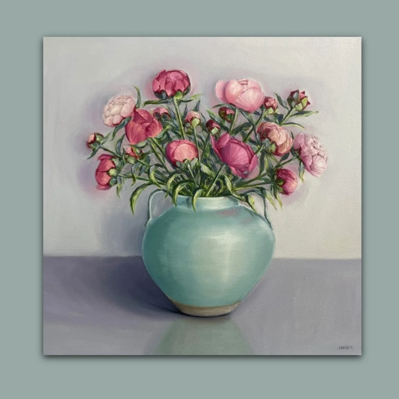 Vibrant pink peonies in a celadon vase by British still life artist Jonquil Williamson
