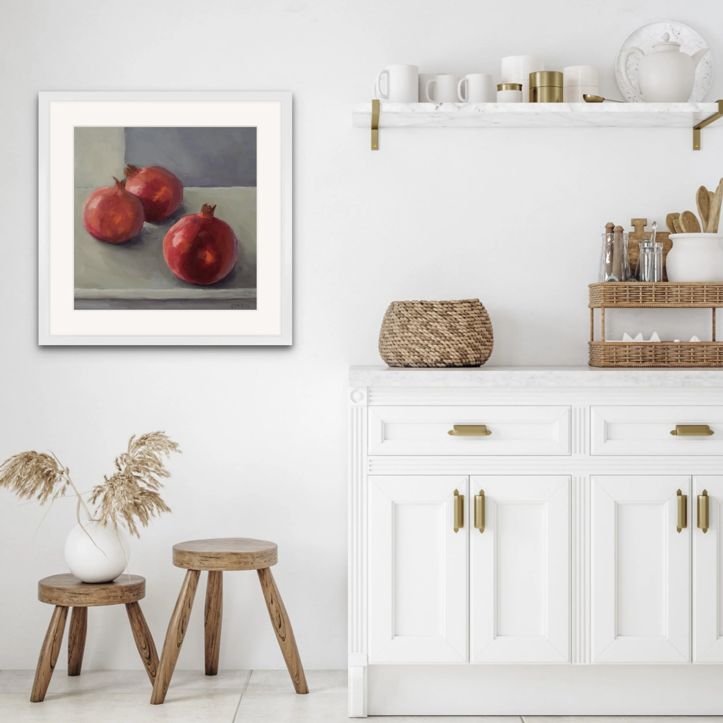 Fine art print of pomegranates on a muted sage surface with warm orange highlights and soft shadows by Jonquil Williamson.JPEG