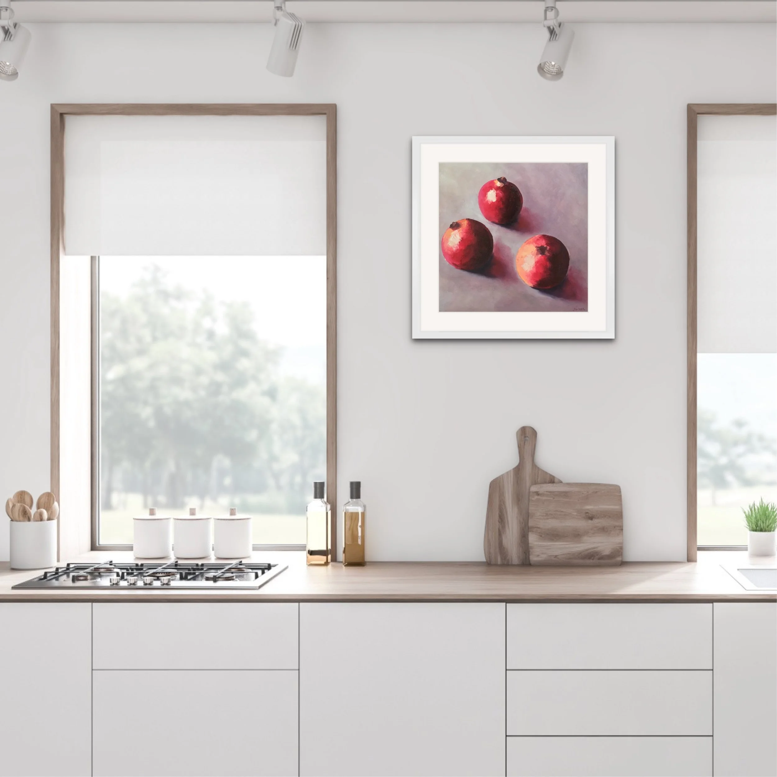 Fine art giclée print of red and coral pomegranates arranged in a triangular composition against a soft pink background by jonquil Willimson.JPG
