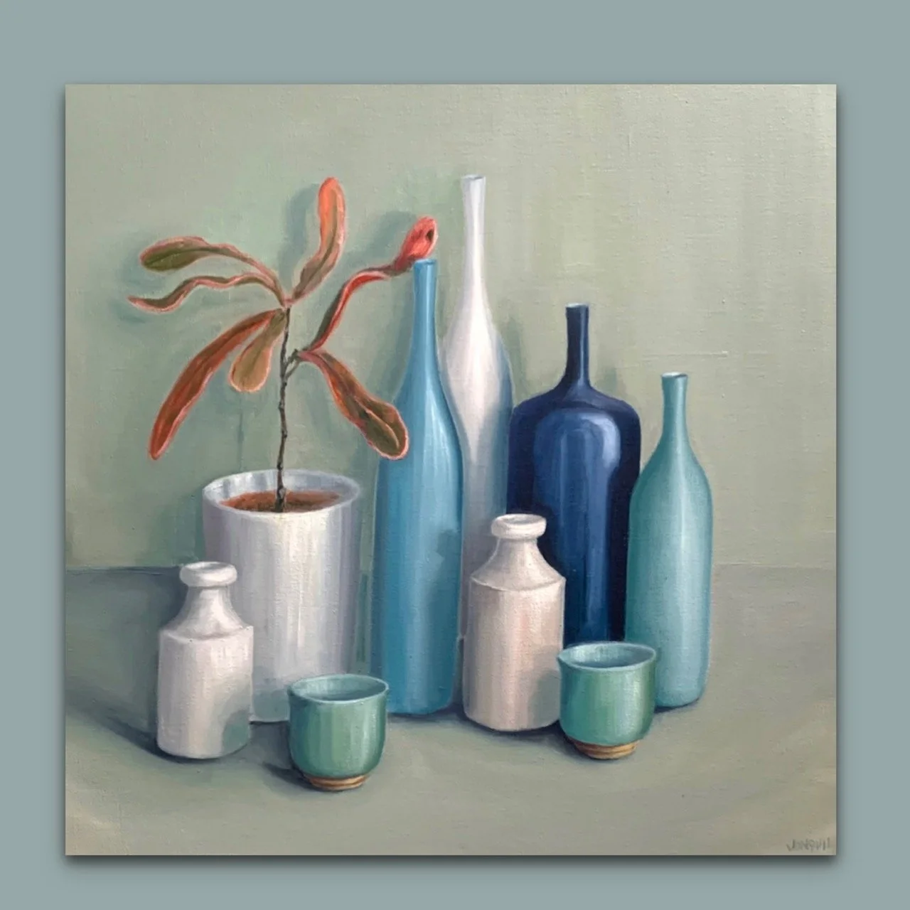 A pink and green succulent in tall blue and white pots by British still life artist Jonquil Williamson