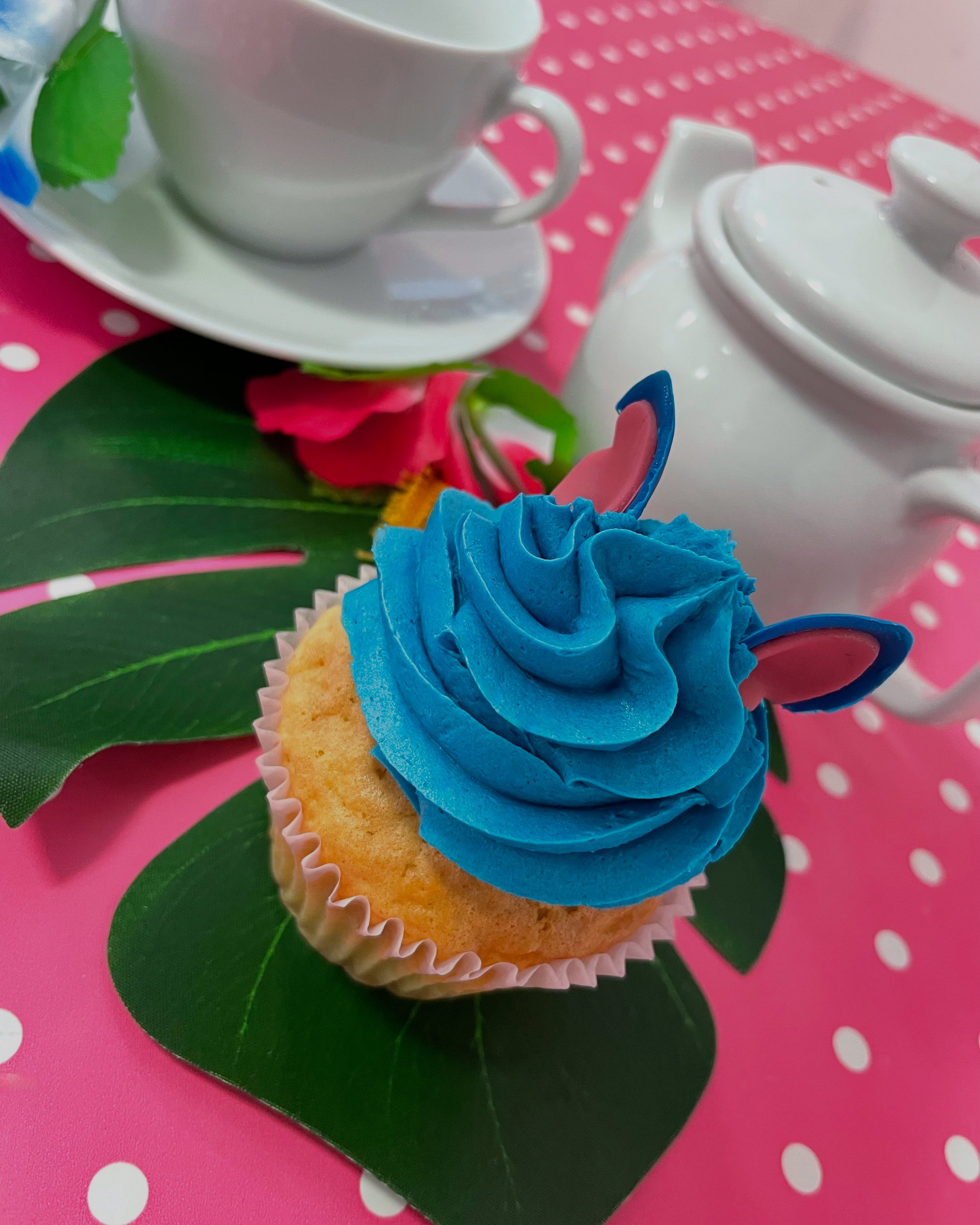 12 x Stitch themed cupcakes | 6 printed | 6 with stitch sp ears | blue ff frosting