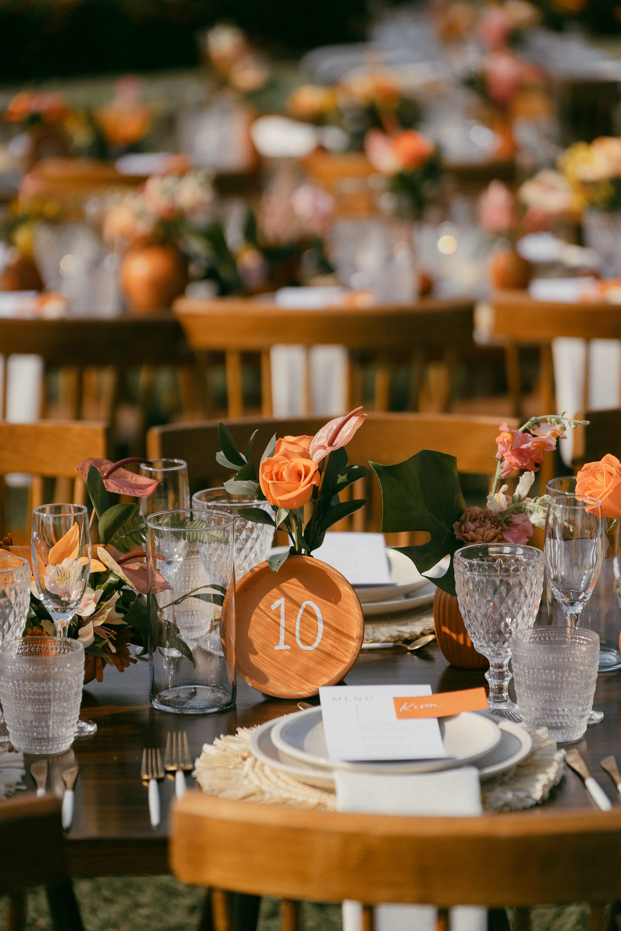 Destination wedding table setting with tropical flowers at Hacienda Pinilla in Guanacaste.
