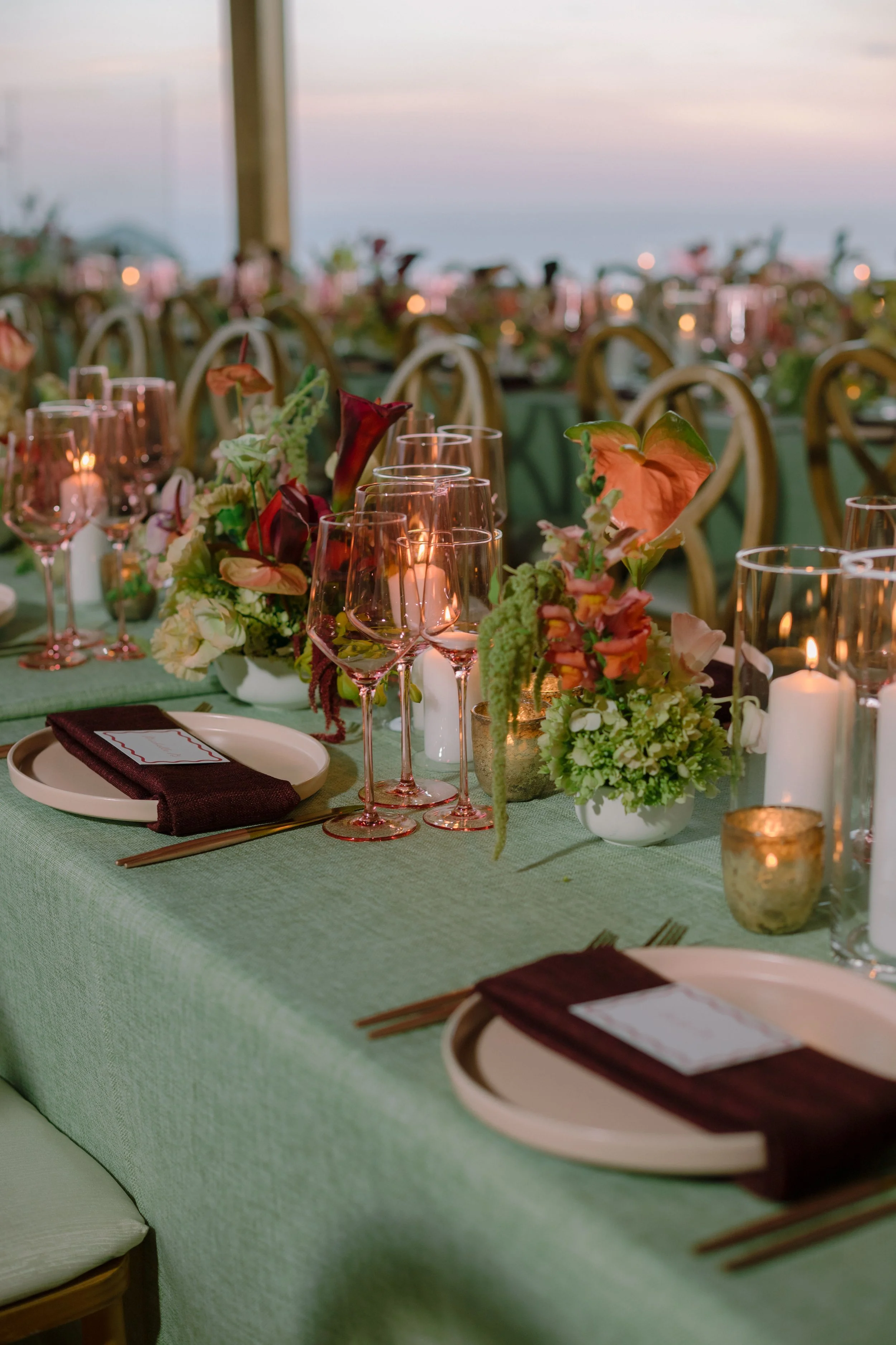 Contemporary wedding centerpiece with sculptural flowers and organic textures.