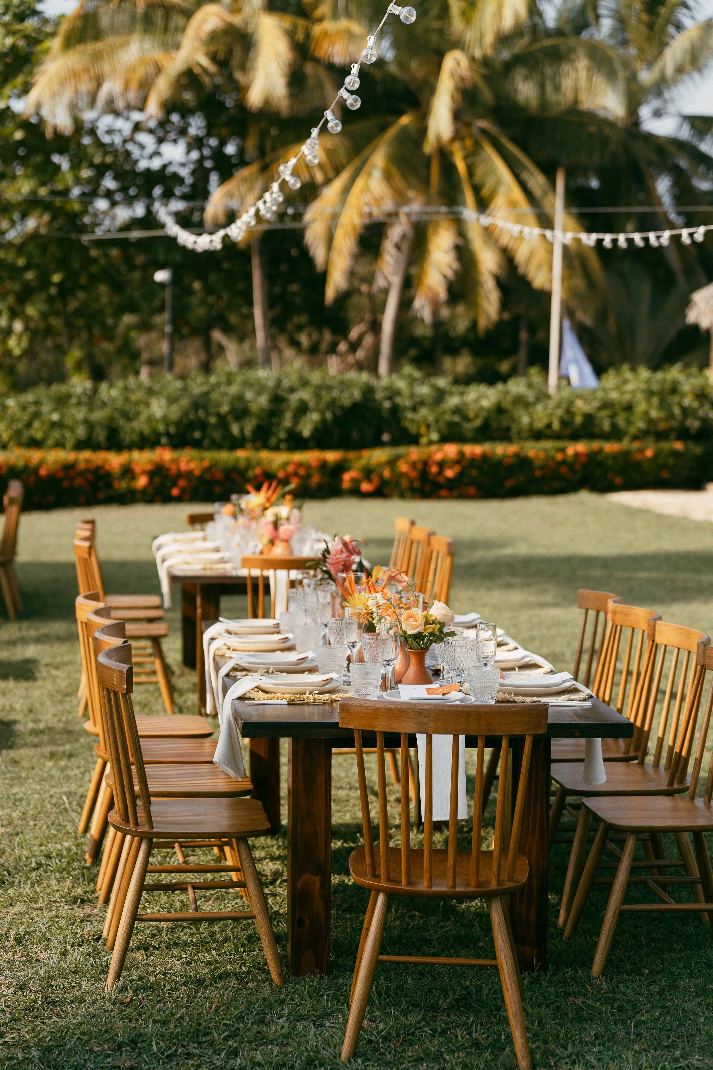 Elegant wedding reception decorated with pastel tropical flowers at Hacienda Pinilla, Costa Rica.