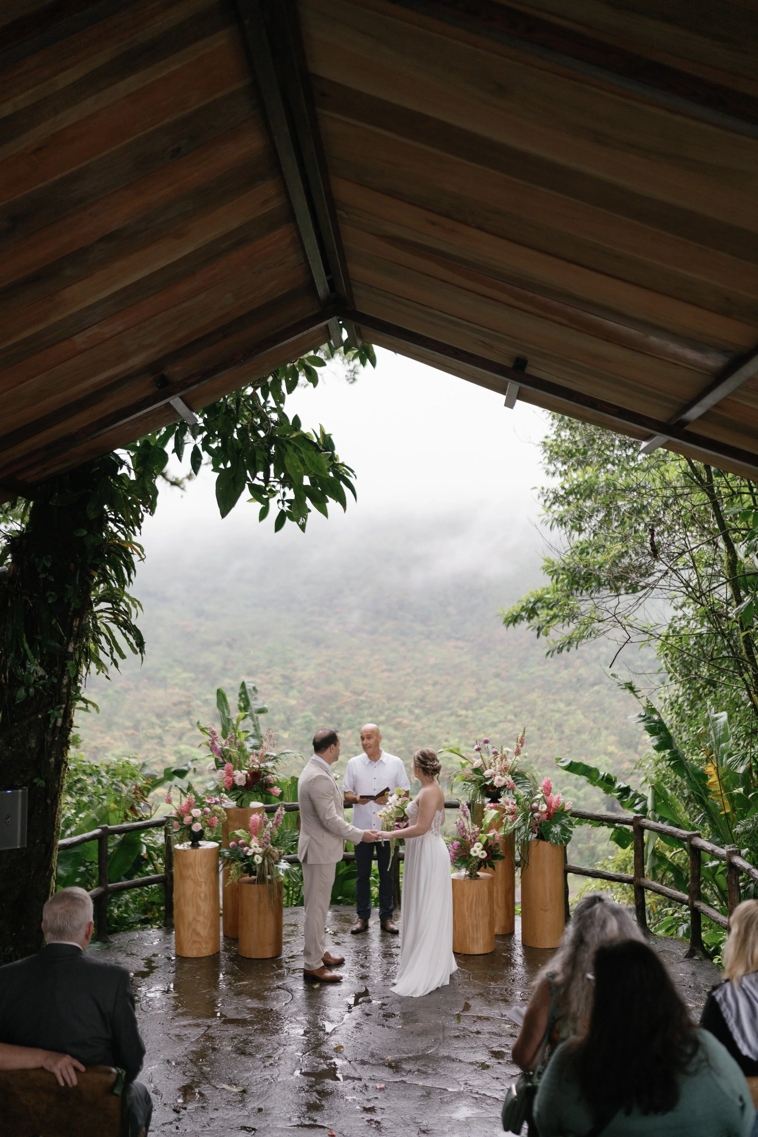 Elegant ceremony flowers for a destination wedding in La Fortuna, Costa Rica.