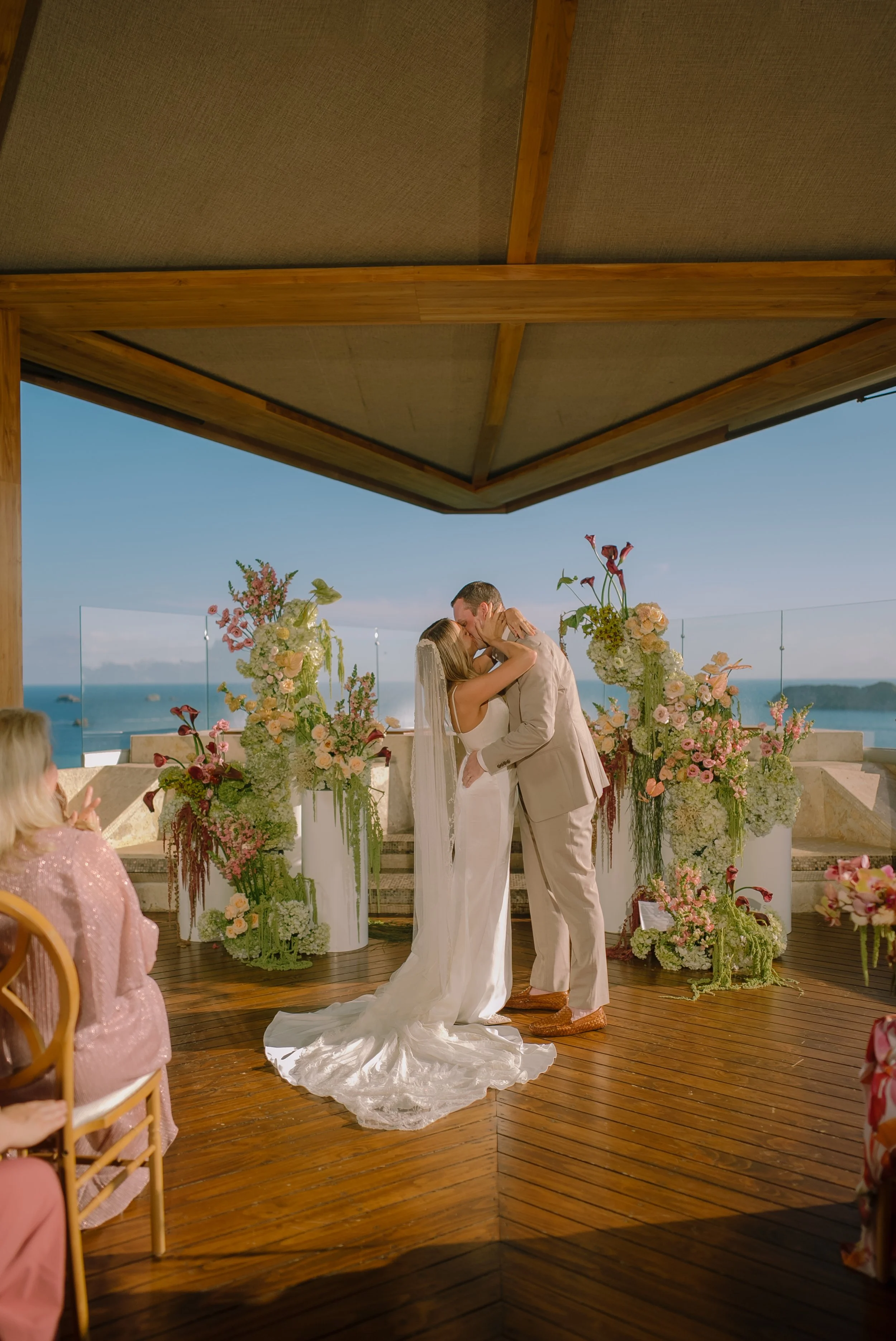Sculptural wedding floral arrangements in warm muted tones in Manuel Antonio, Costa Rica