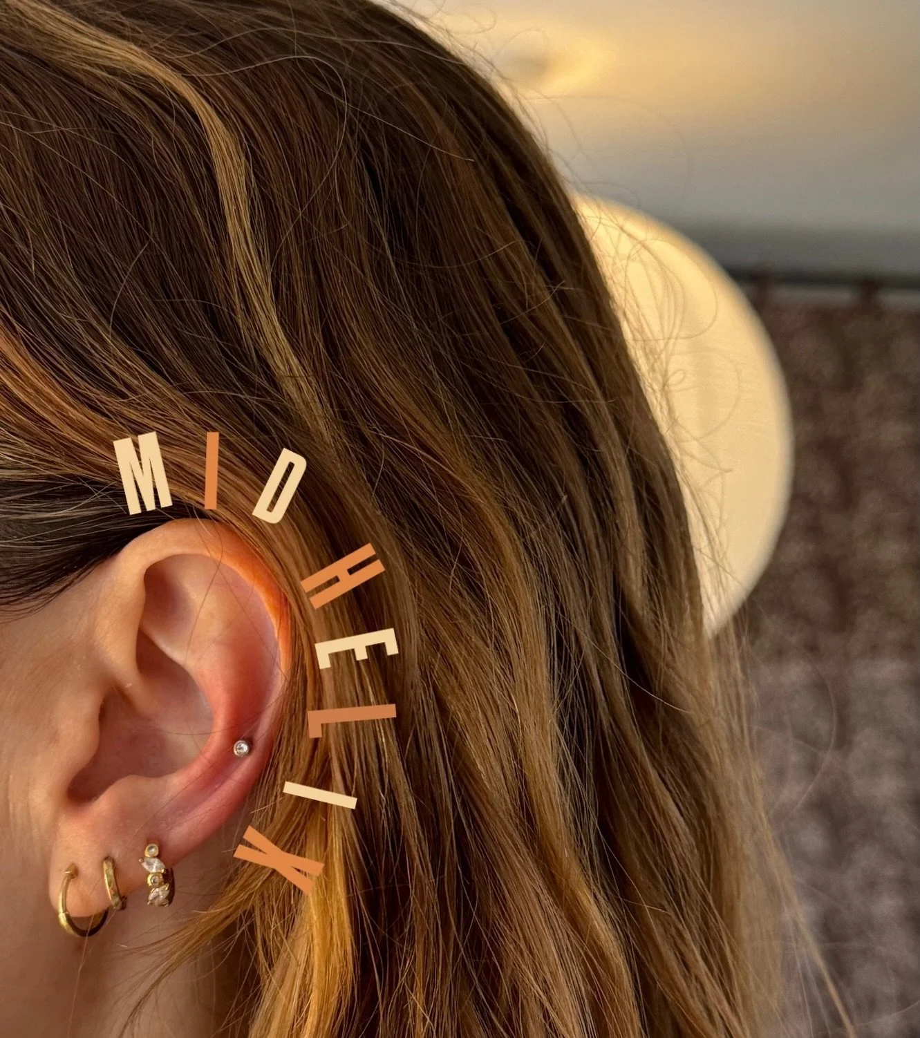We love a simple little sparkle to break up the ear.  This piercing is a helix, also known as a mix helix. Healing time varies but downsizing your bar at 8 weeks is essential to the healing process. #stalbanspiercings