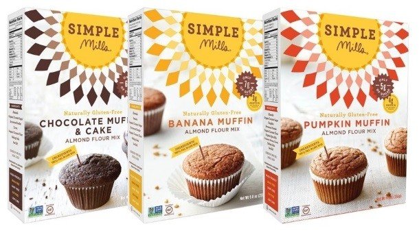 Three boxes of Simple Mills muffin mix are lined up in a row.