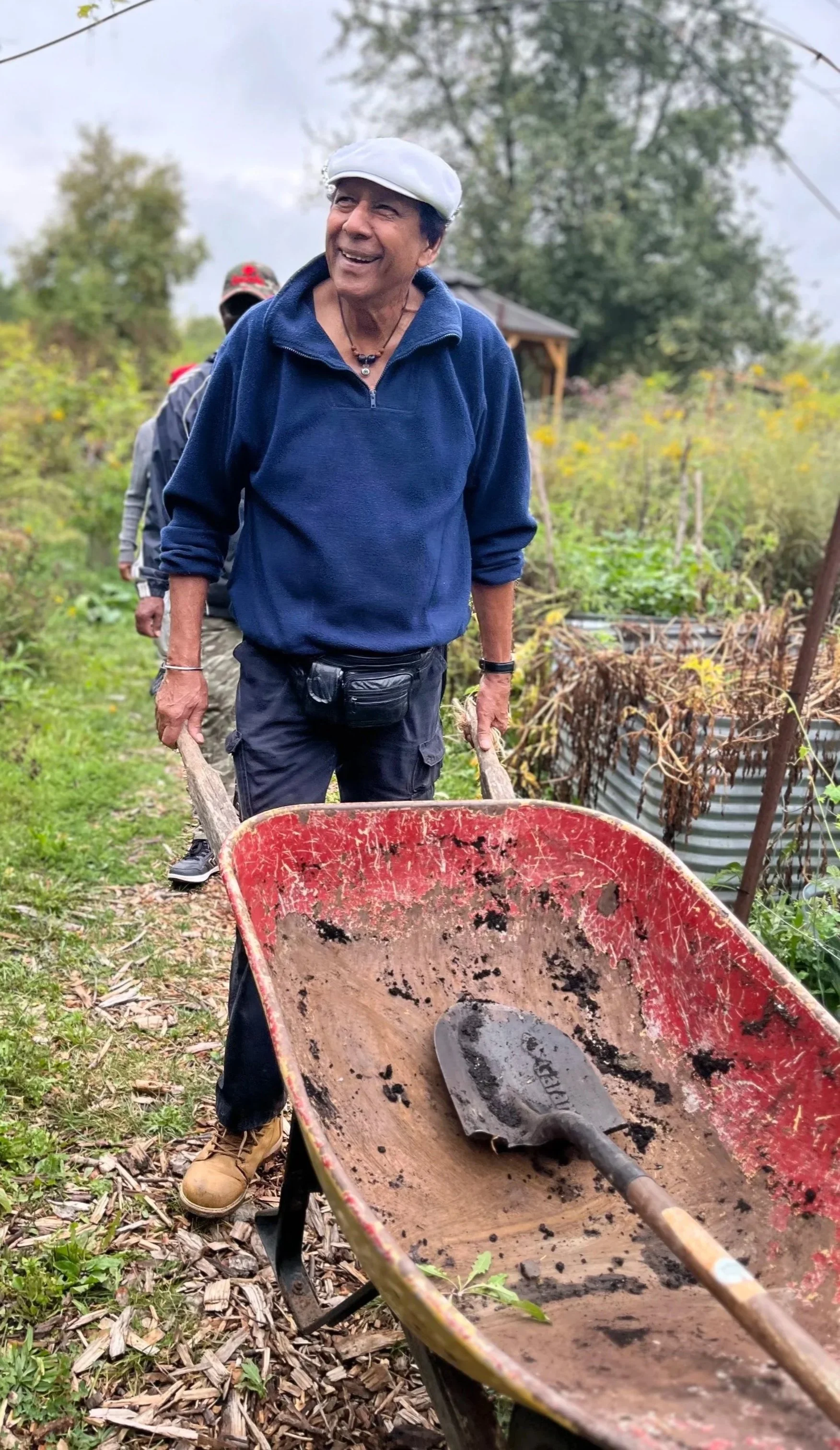 Senior enjoying a wellness program at Black Creek Community Farm in Northwest Toronto
