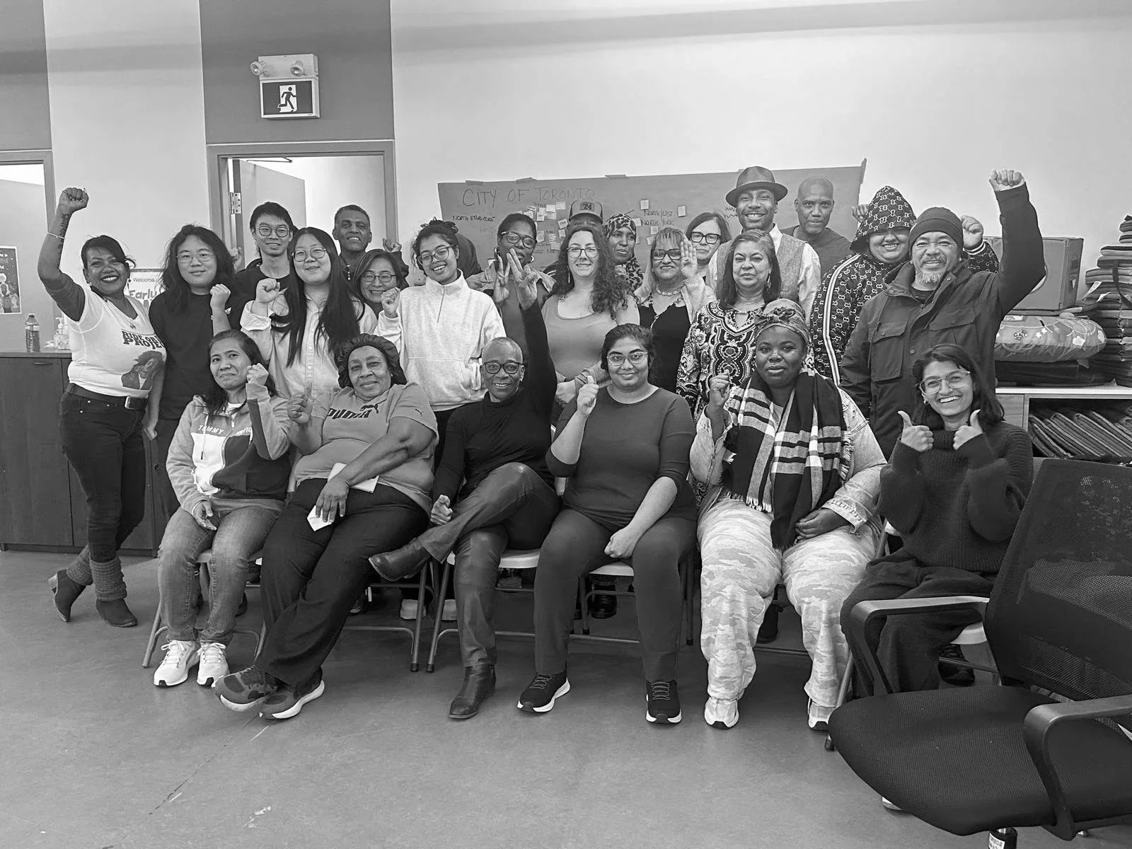 Group of participants smiling in a group photo