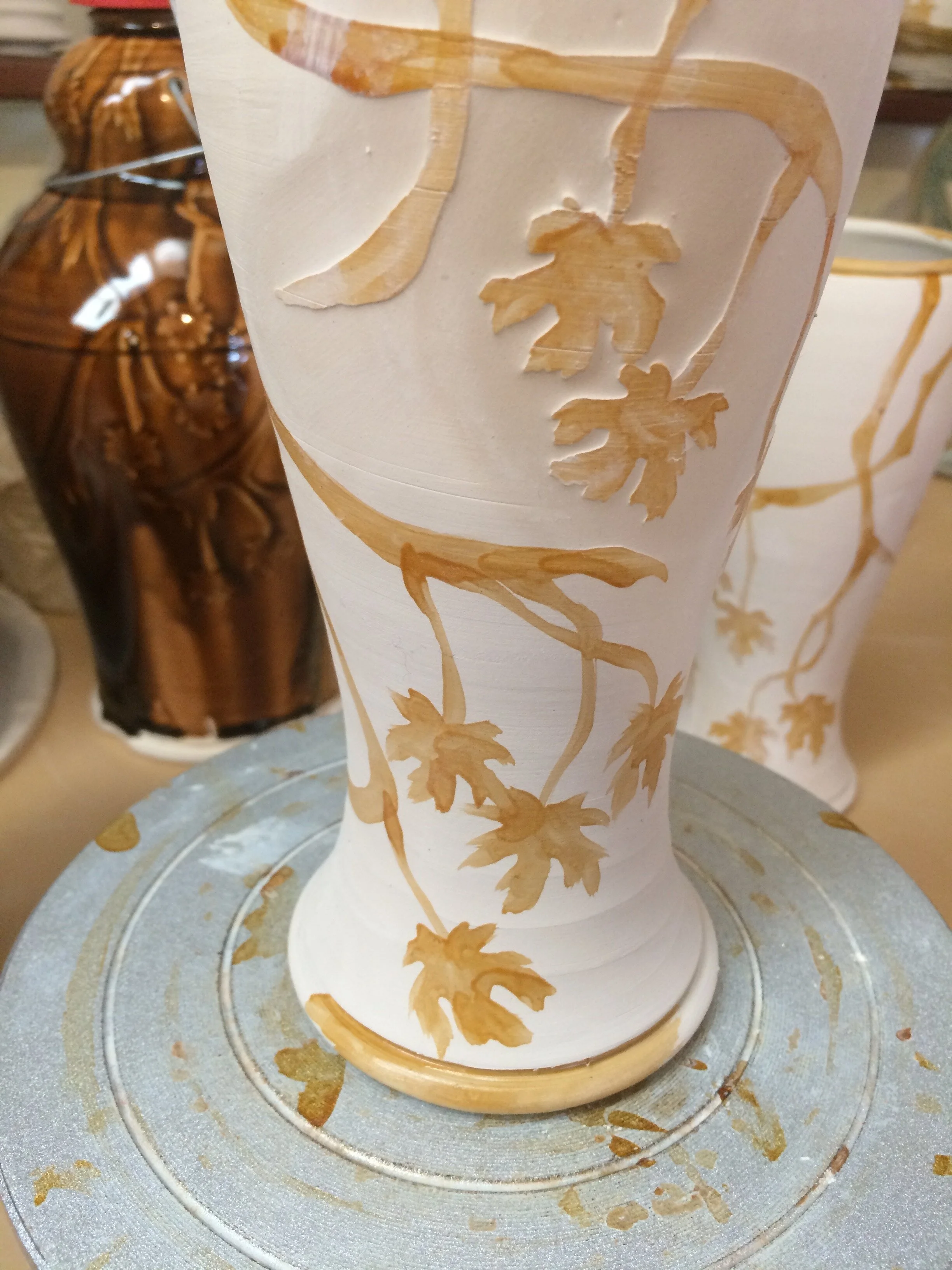 A shellac etched maple leaf design.