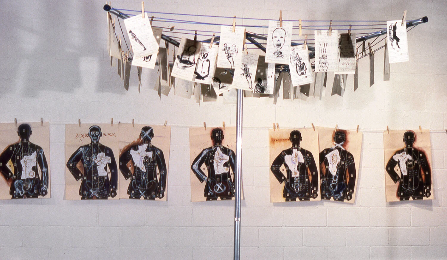 Targets & Death Certificates on Clothes Lines