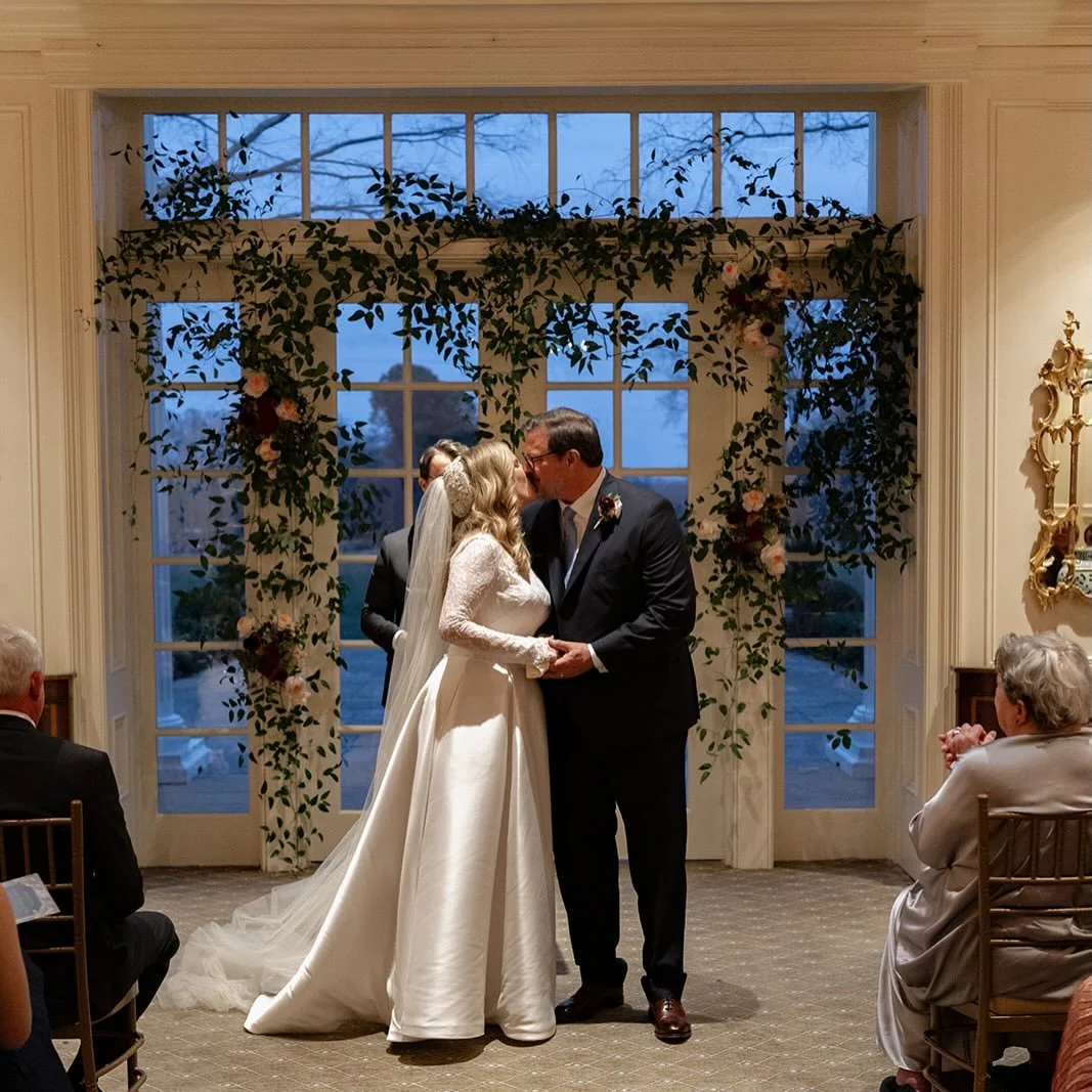 Congratulations to the happy couple 🤍 A snowy wedding day full of so much joy!

This smilax floral installation really elevated their ceremony space and created the perfect focal point in this ballroom. 

@maryhollandgriffin 
@eventswithoutahitch 
@