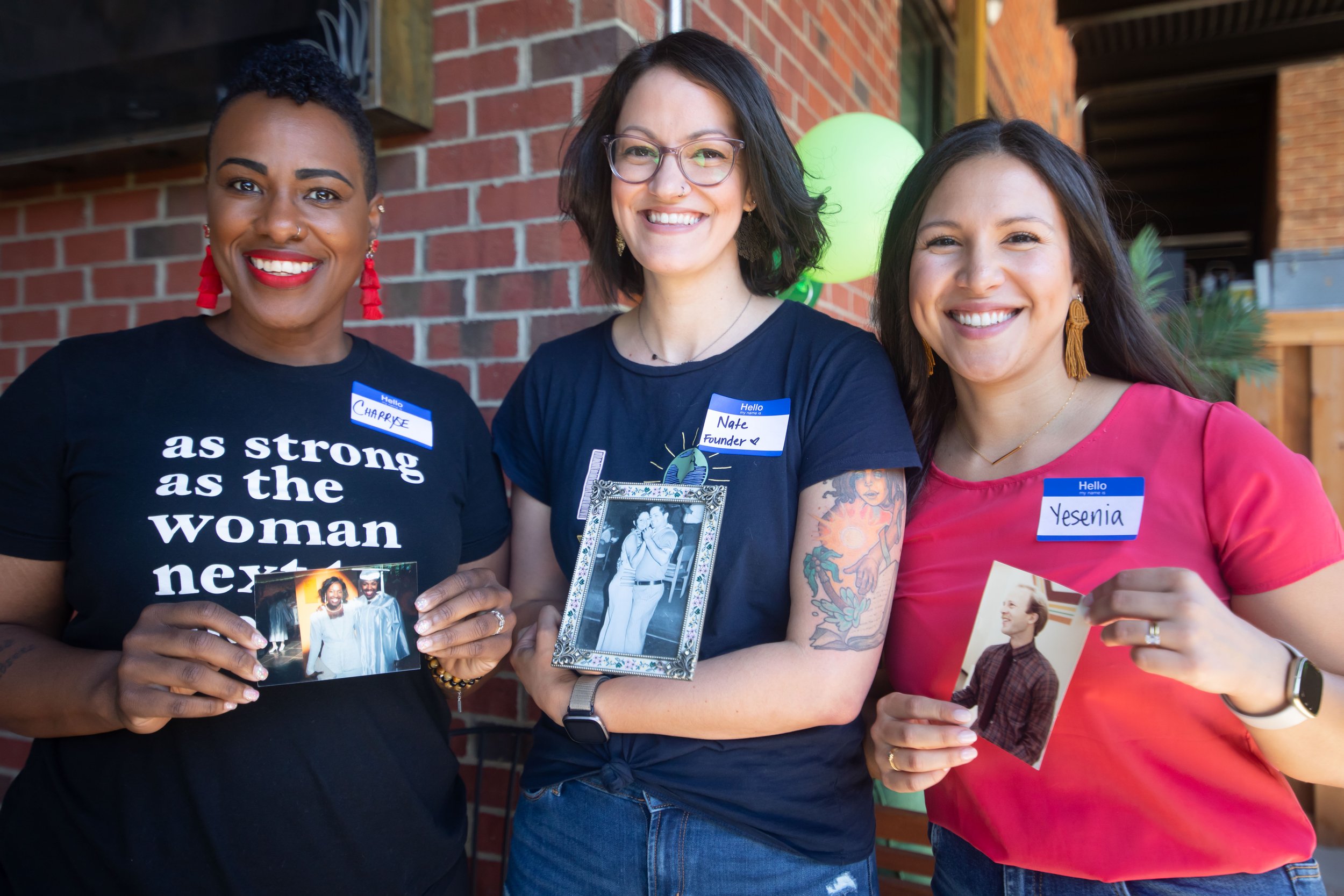  Leaves from Stella board members (from L to R) Charryse Johnson, Nathalie Santa Maria, and Yesenia Howell hold photos of the parents they’ve lost.  