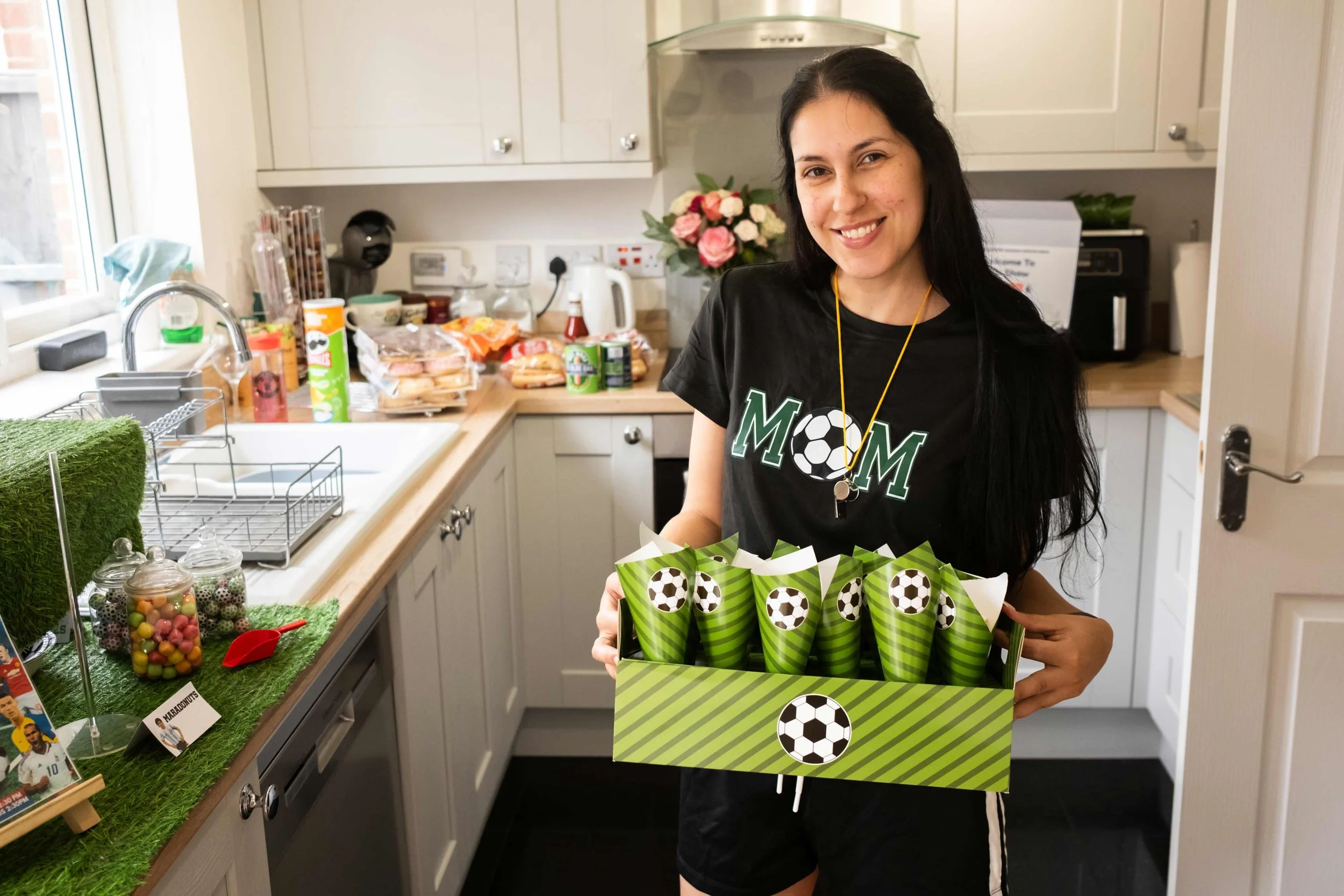 Anya at Football Legend’s birthday party with popcorn holders