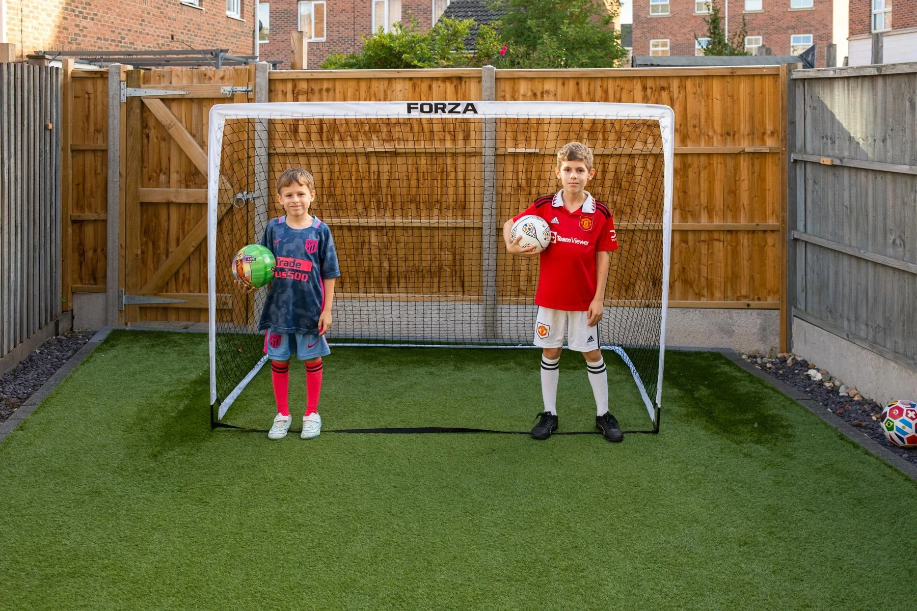 Boys in front of FORZA pop-up goal