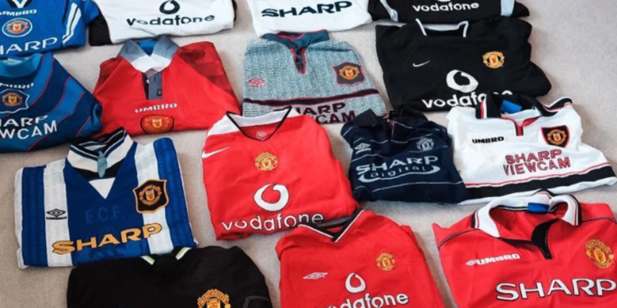 Old Manchester United football shirts waiting to be sold