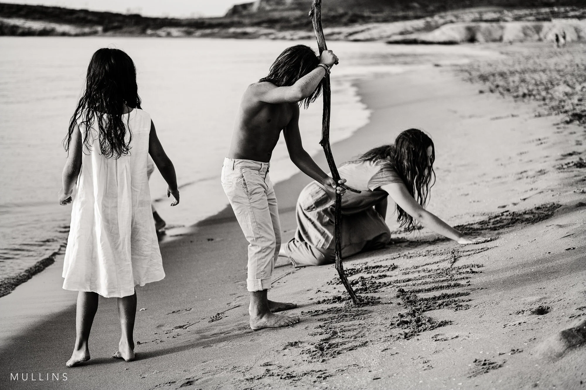 Children playing on a beach in Spain