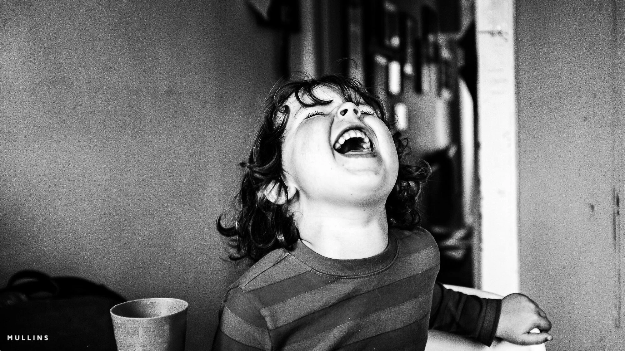 A little boy laughing