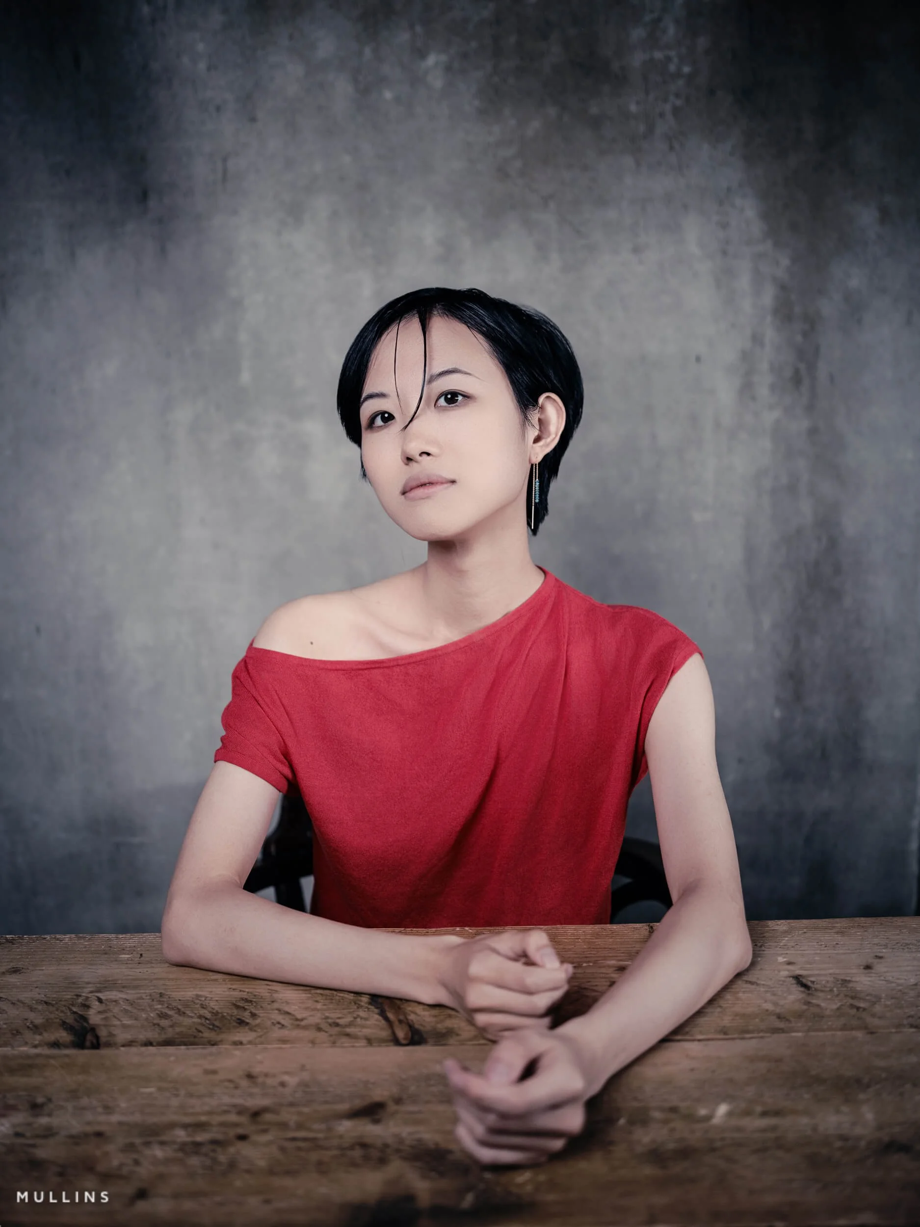 portrait of a musicologist in a studio