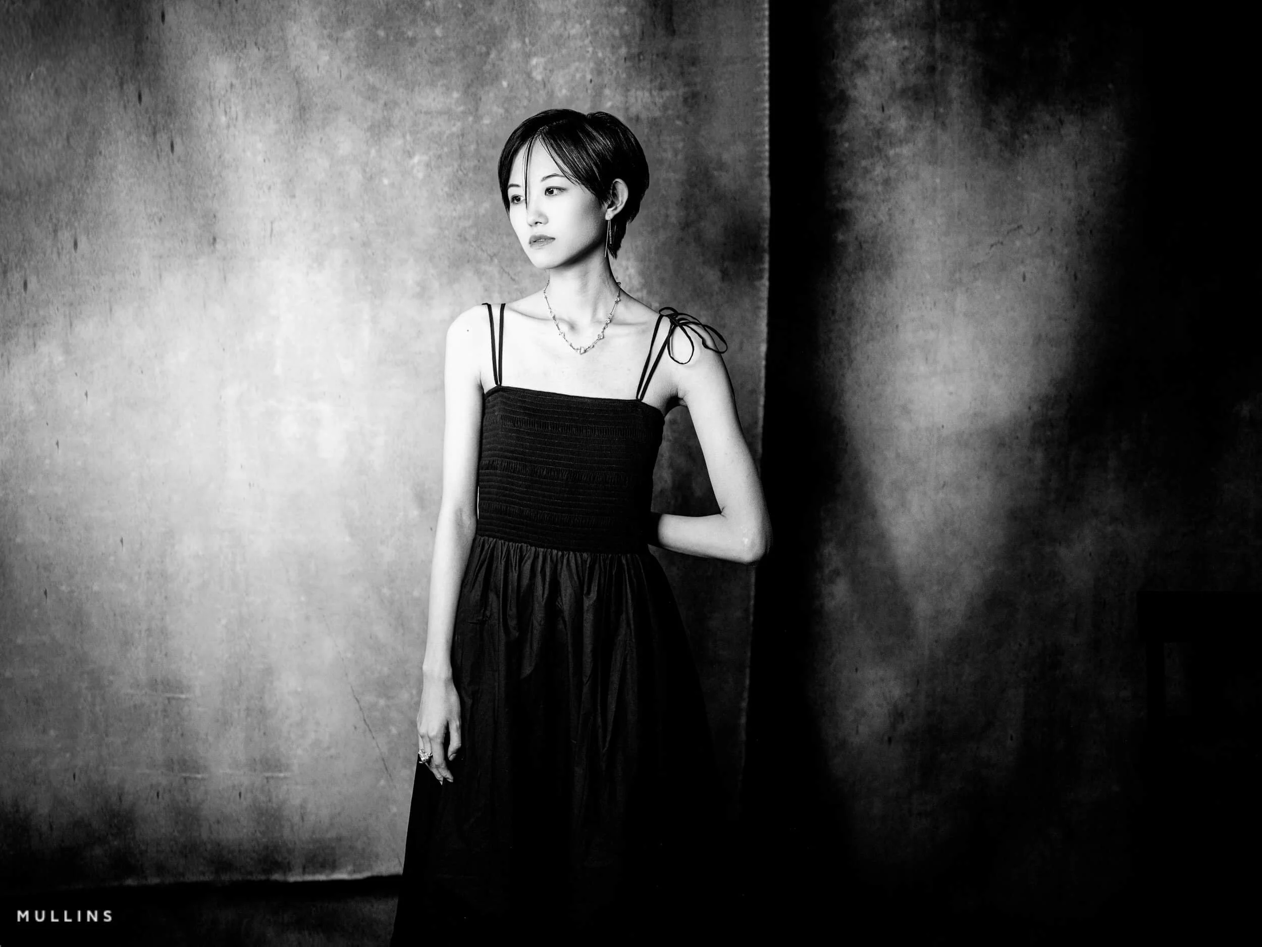 full length black and white studio photograph