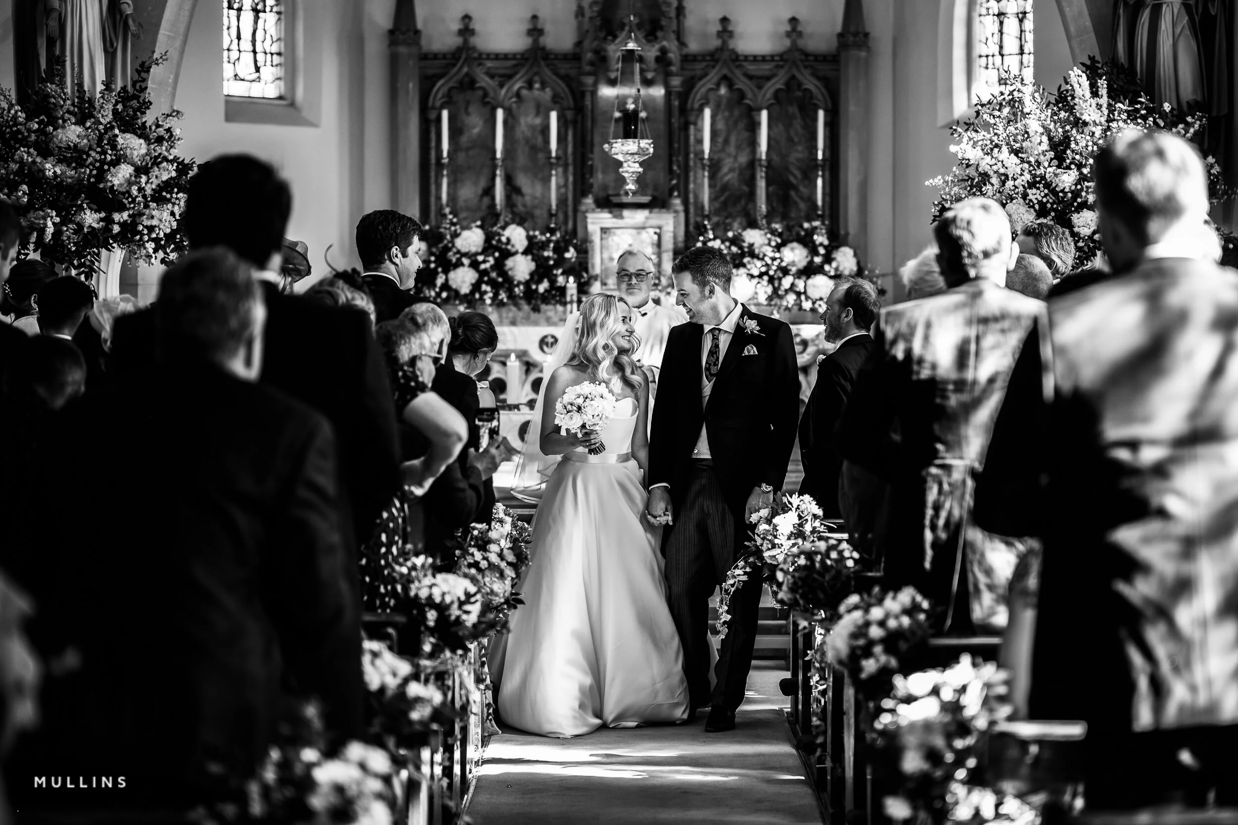 Bride and groom leaving the church