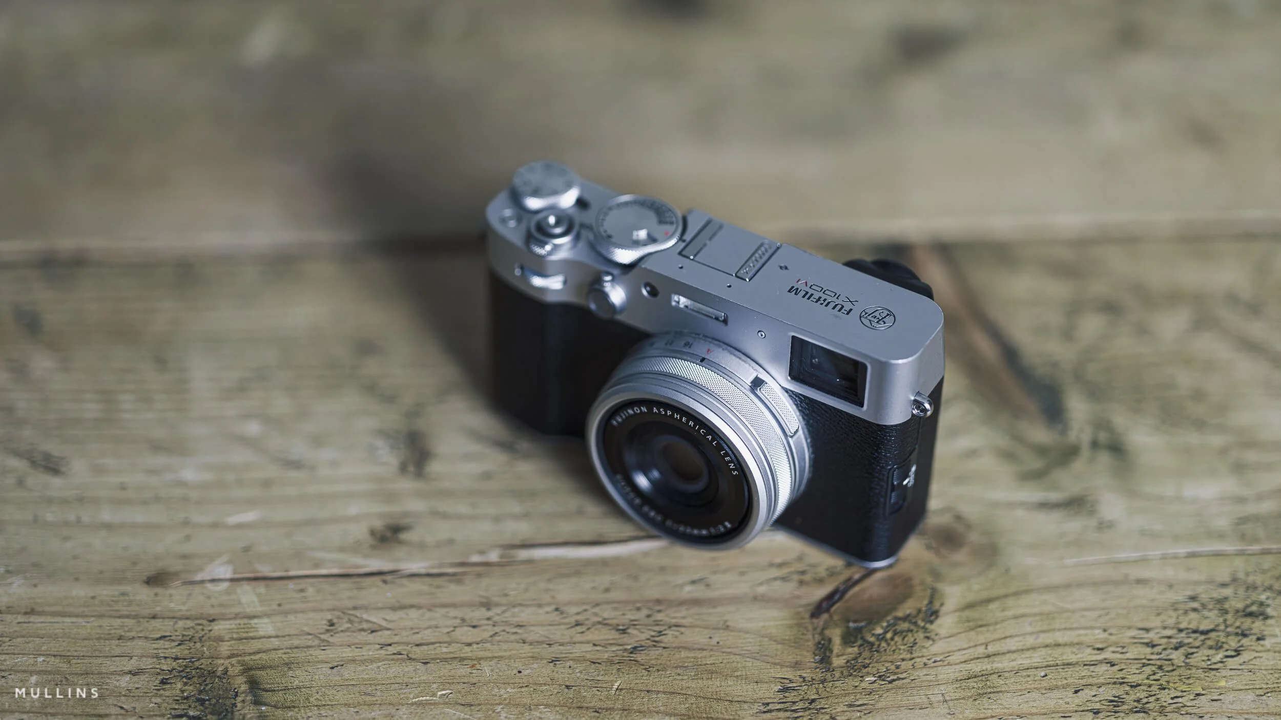 The Fujifilm X100VI on a table.