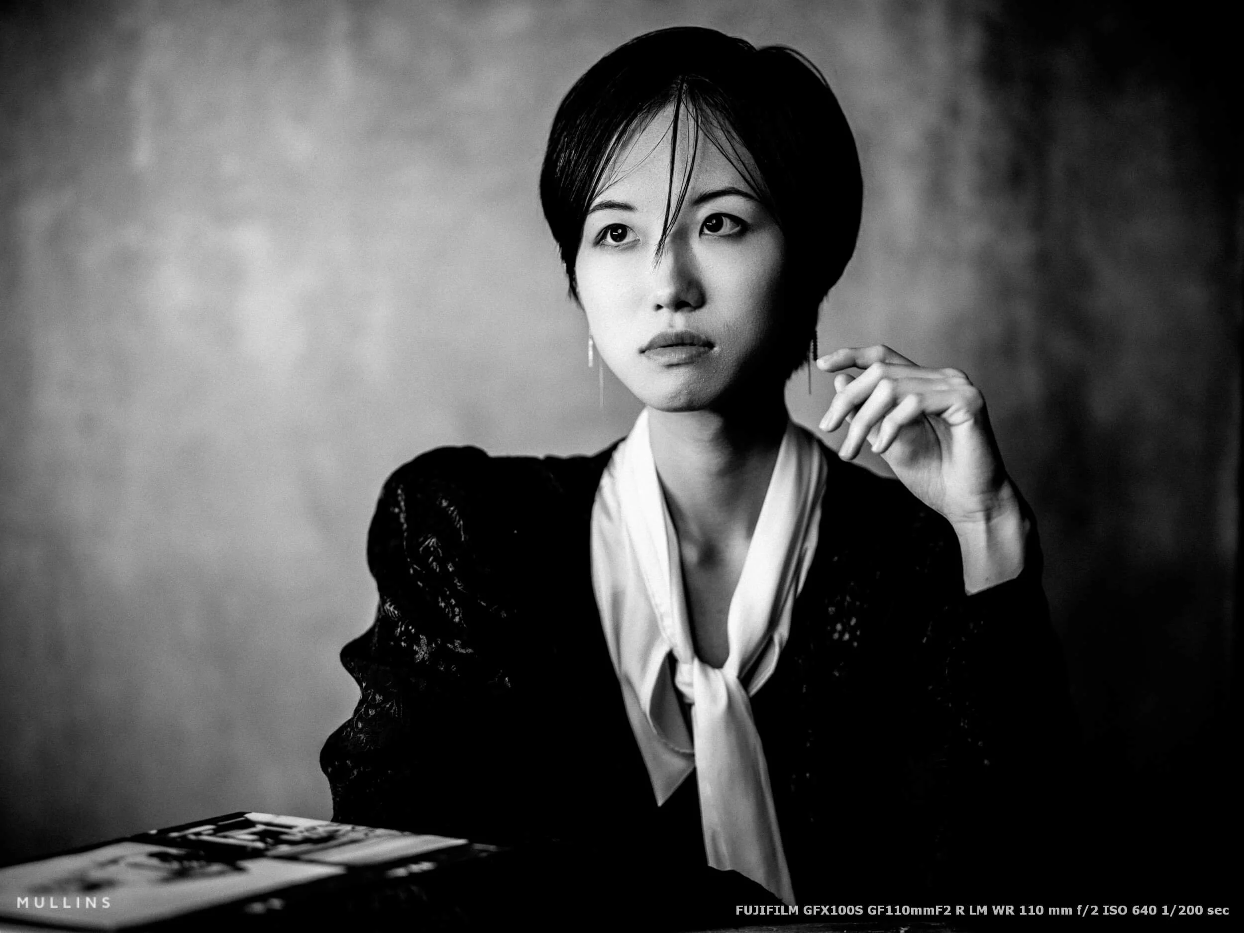 A portrait of a lady in black and white shot with the Fujifilm GF110 Lens.