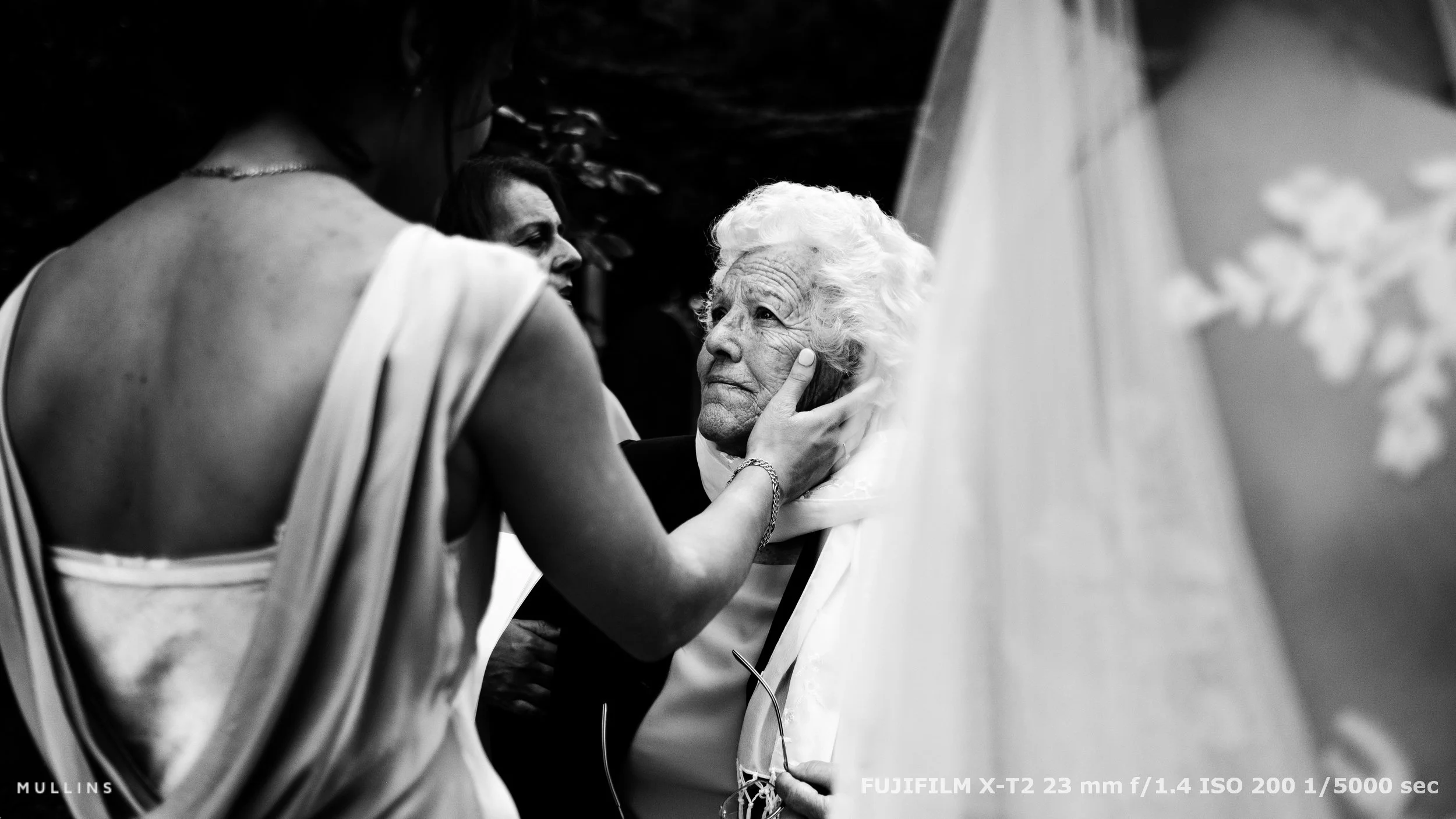 Documentary Wedding Photograph of a Bridesmaid and her Grandmother