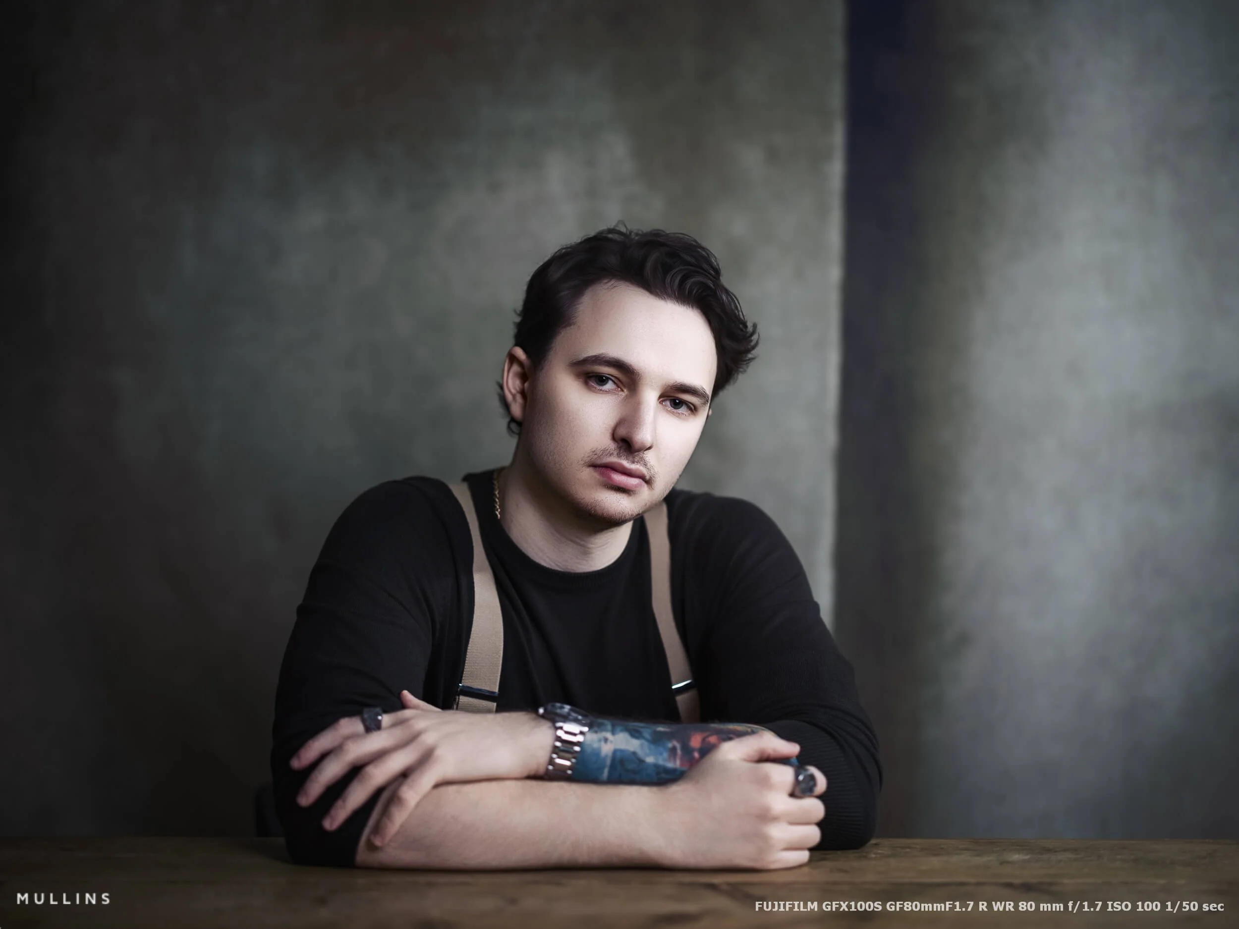 A portrait of a man in a studio shot on a Fujifilm GFX100S Camera.