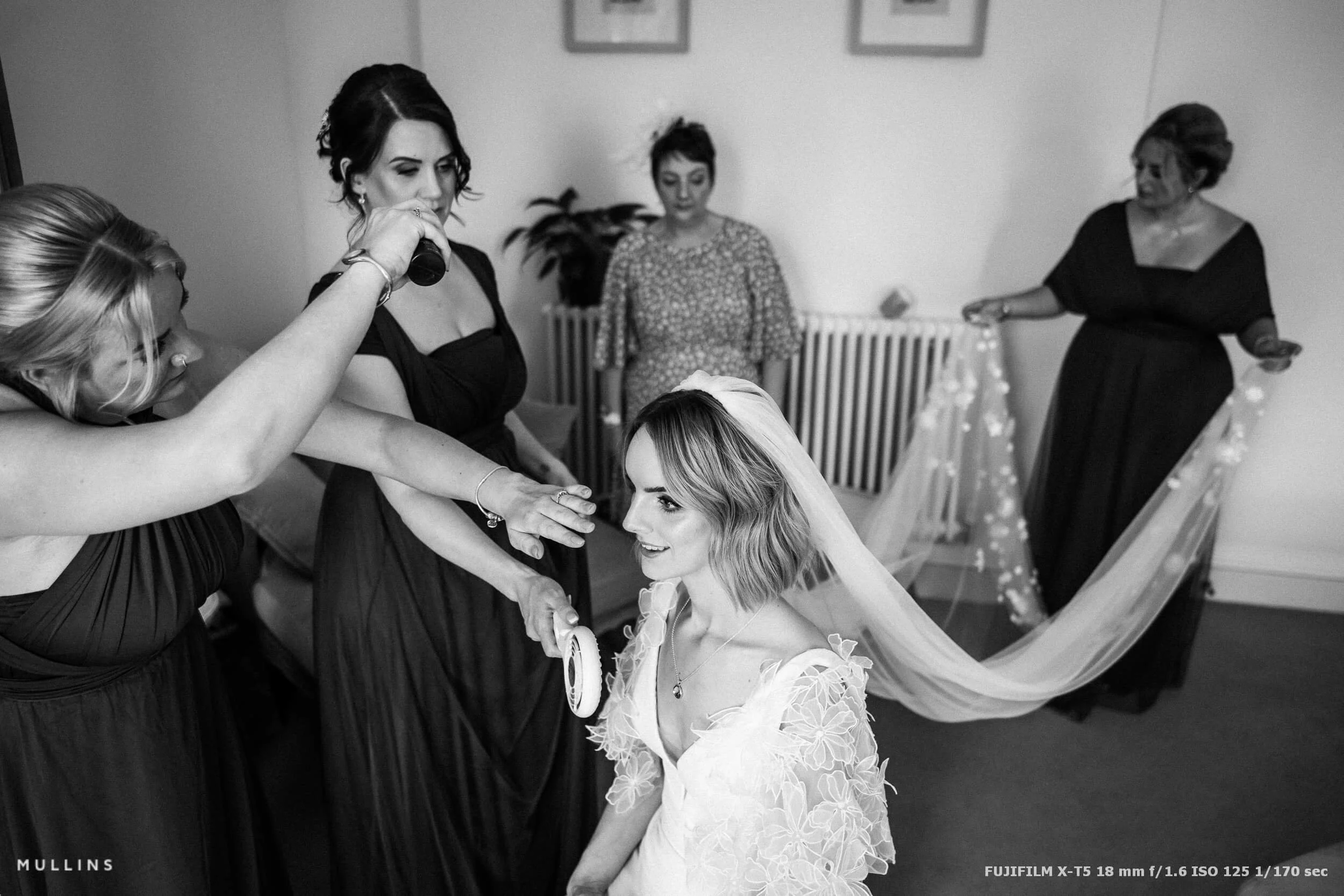 Wide documentary photograph showing layered storytelling in a real environment.