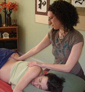 Lena giving prenatal massage circa 2008