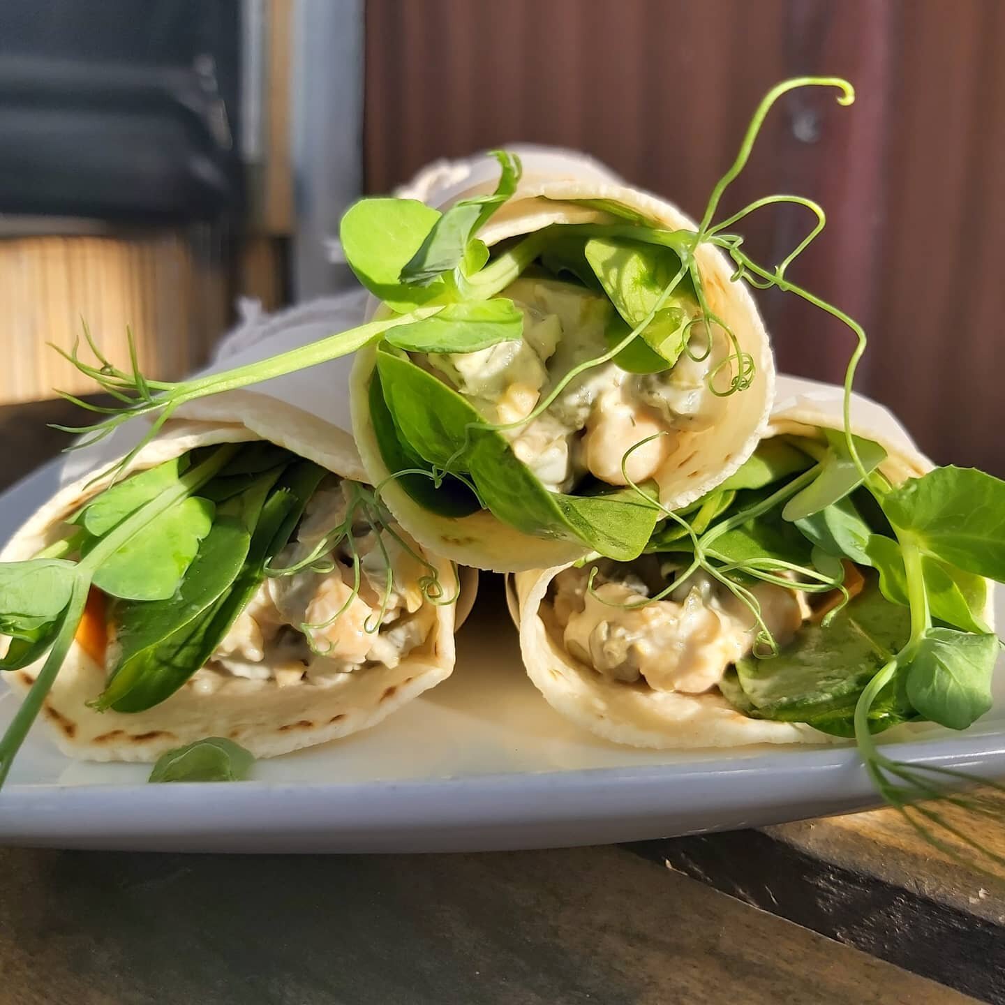 Charlie &quot;Tuna&quot; is back and in my opinion better than ever! 🐟

Roasted chickpeas with horseradish mayo, pickles, capers, pickled carrots, toasted nori &amp; baby spinach. All nestled in a delicious gf wrap!

Charlie is vegan and gluten free