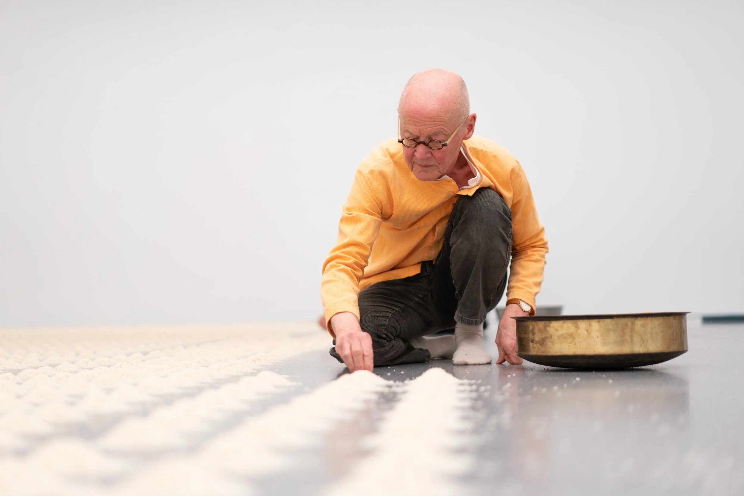 Portrait of Wolfgang Laib during the setup for his exhibition in Bündner Kunstmuseum. The portrait was commissioned by Edition Frida for it's first Edition.