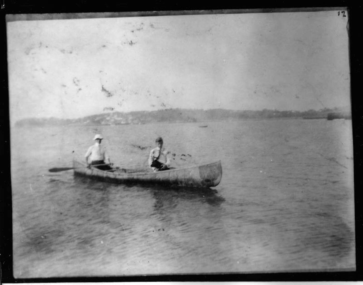 Franklin D. Roosevelt with Hall Roosevelt and the dog, "Duffy" in the canoe made by Tomah Joseph at Campobello, New Brunswick, Canada. (1907)