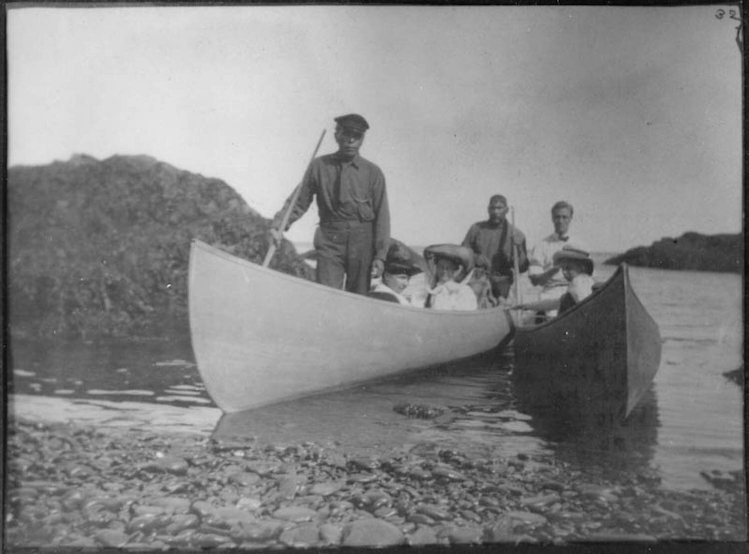 Franklin D. Roosevelt and Eleanor Roosevelt with two Passamaquoddy guides, Cousin Sarah, and Miss Spring on a canoe trip around the island in Campobello, New Brunswick, Canada. (1907)