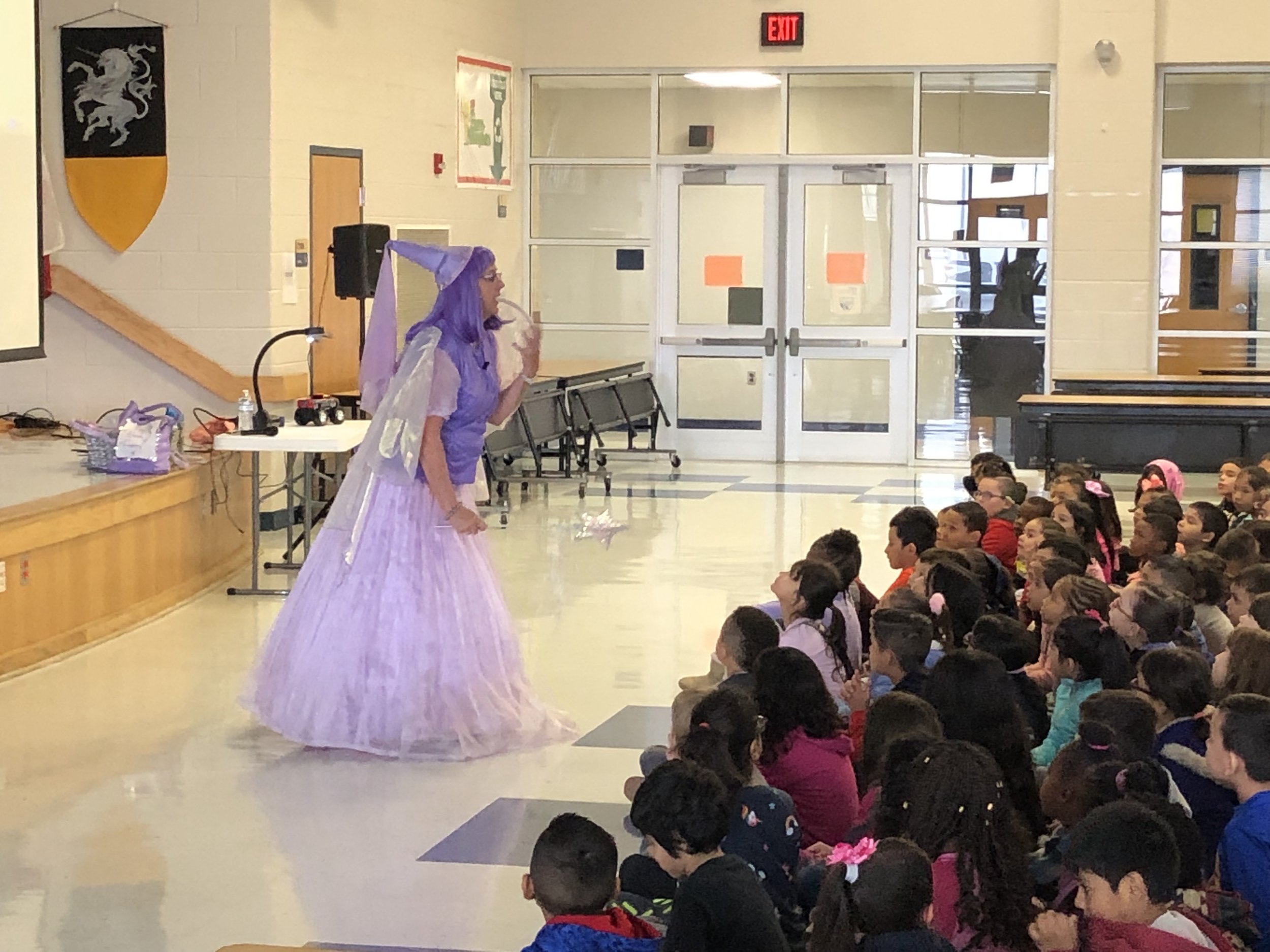 The Book Fairy gets the kids engaged during the program.