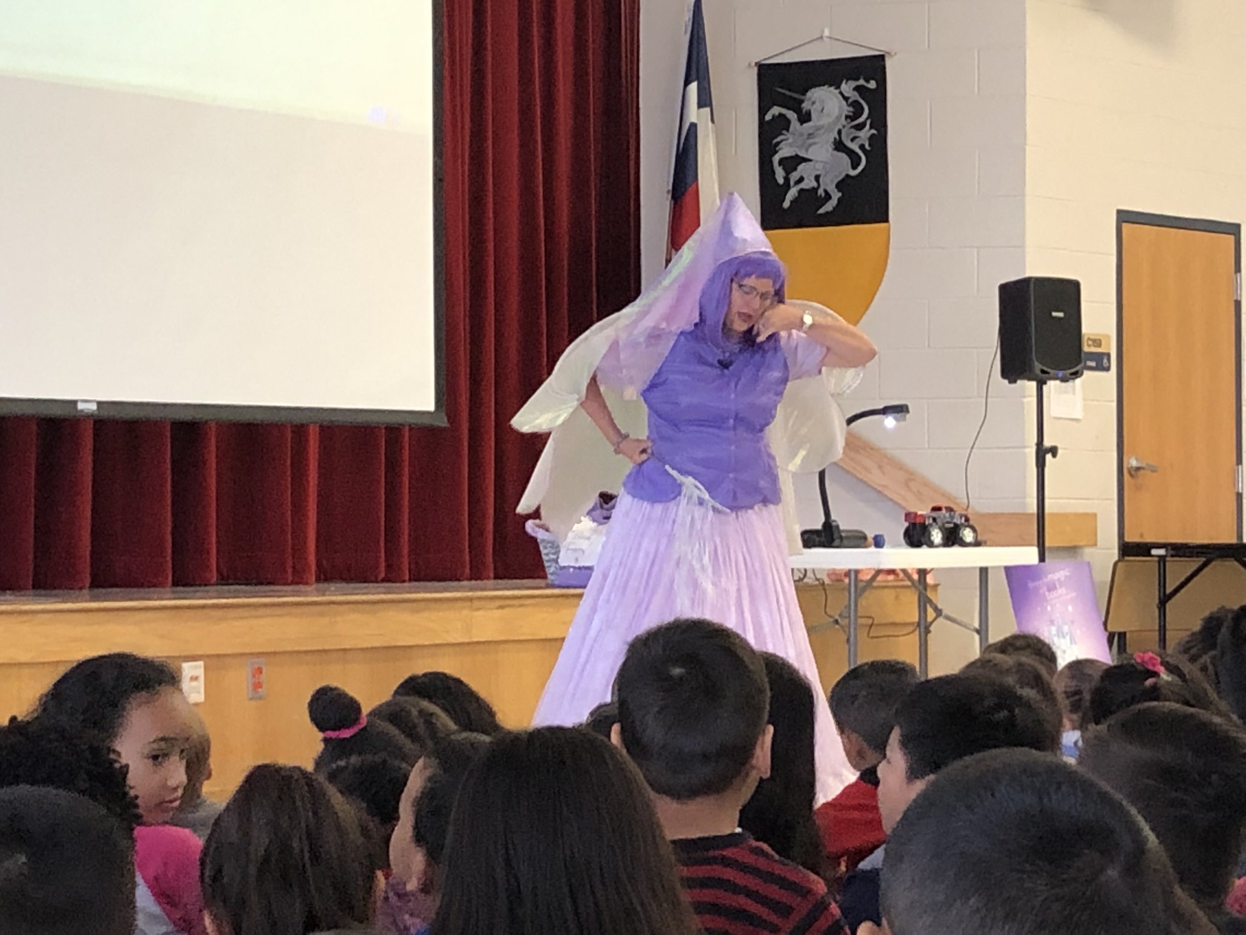 The Book Fairy making magic happen with the student's help.