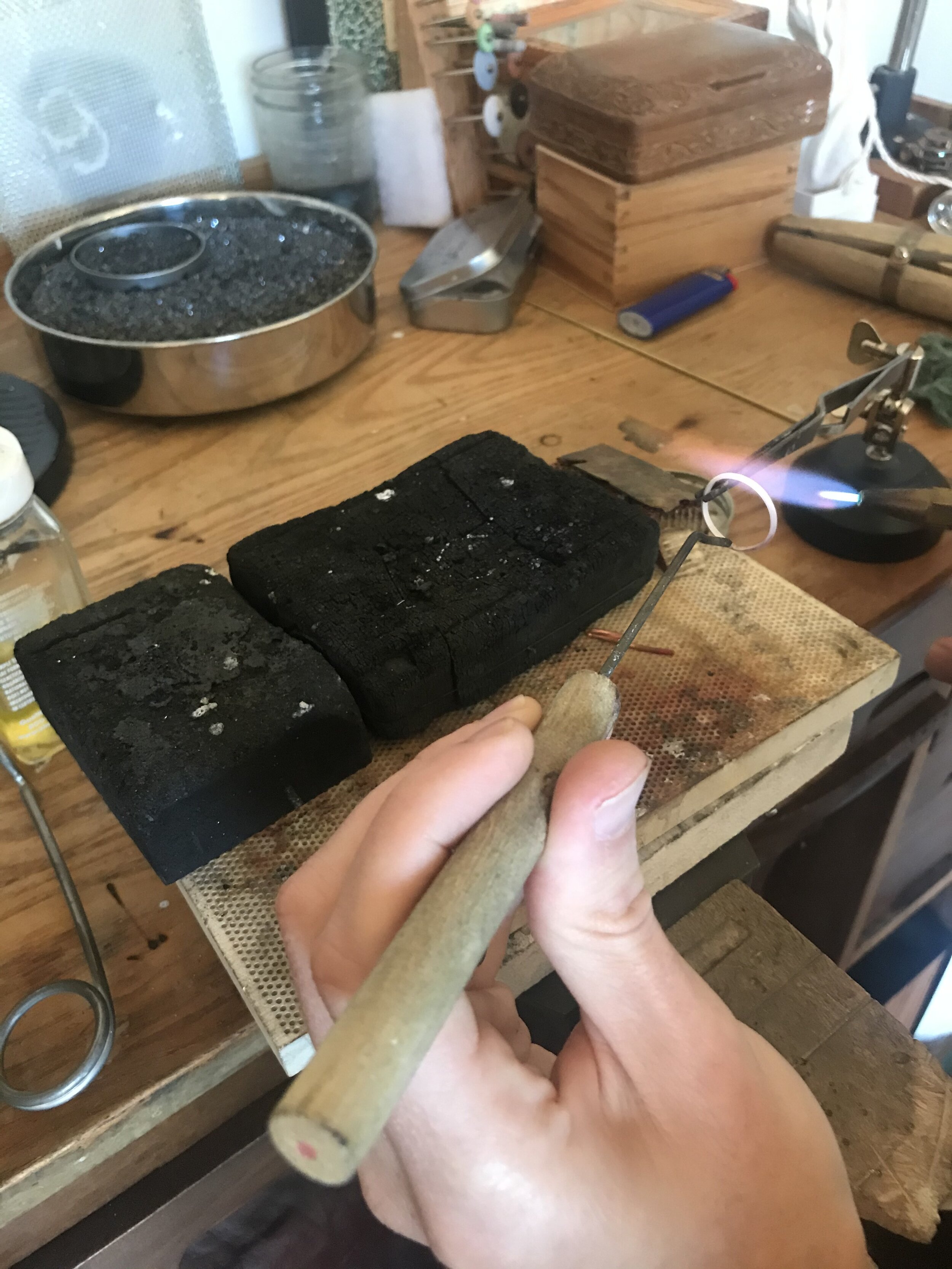 soldering the beginnings of a shank for a ring.