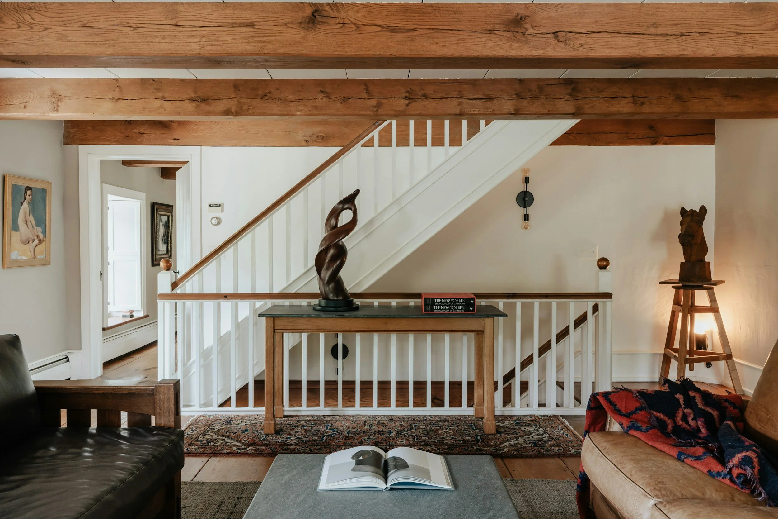 cozy den with reclaimed wood beams
