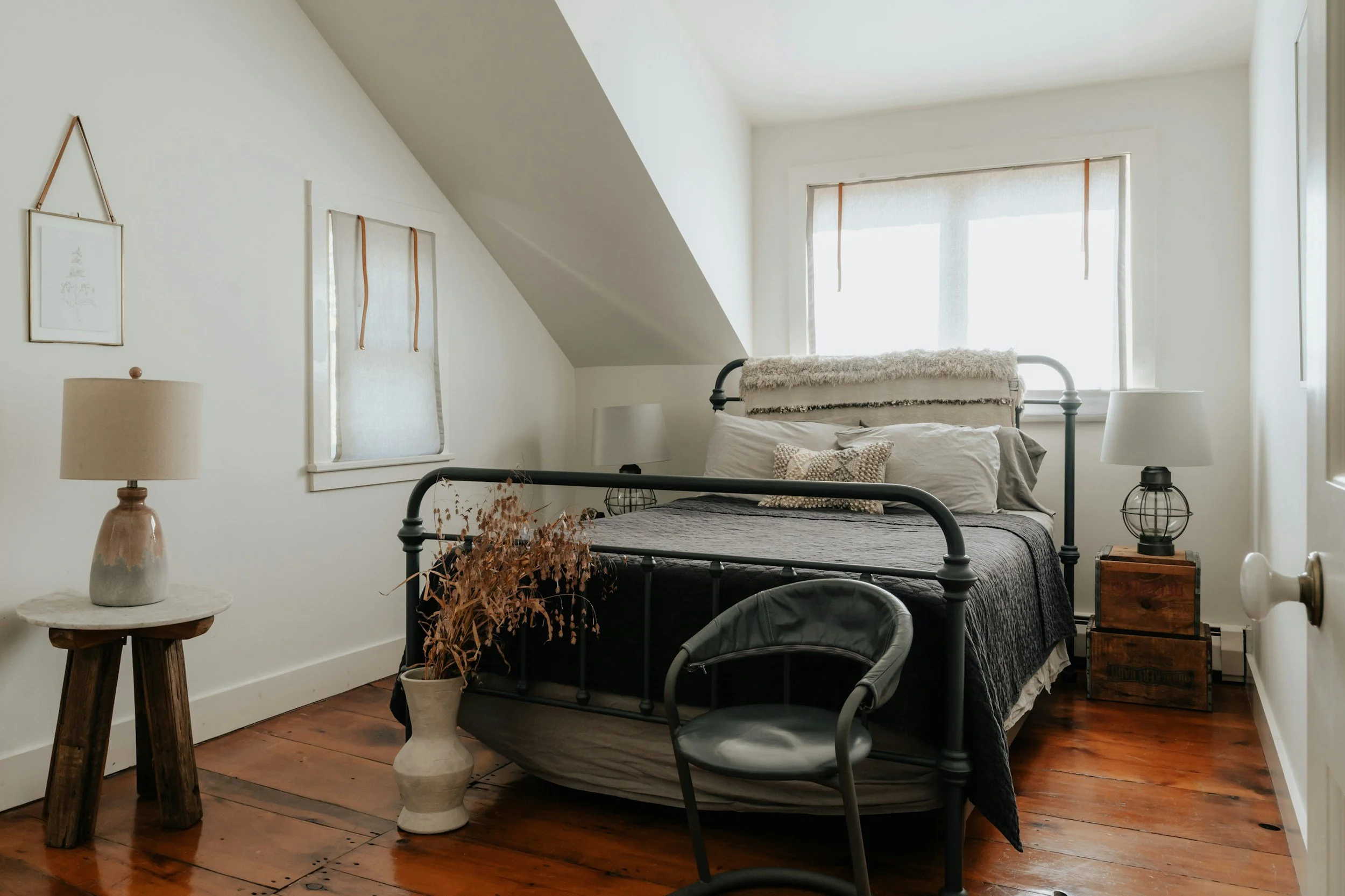 farmhouse bedroom with black metal bed frame