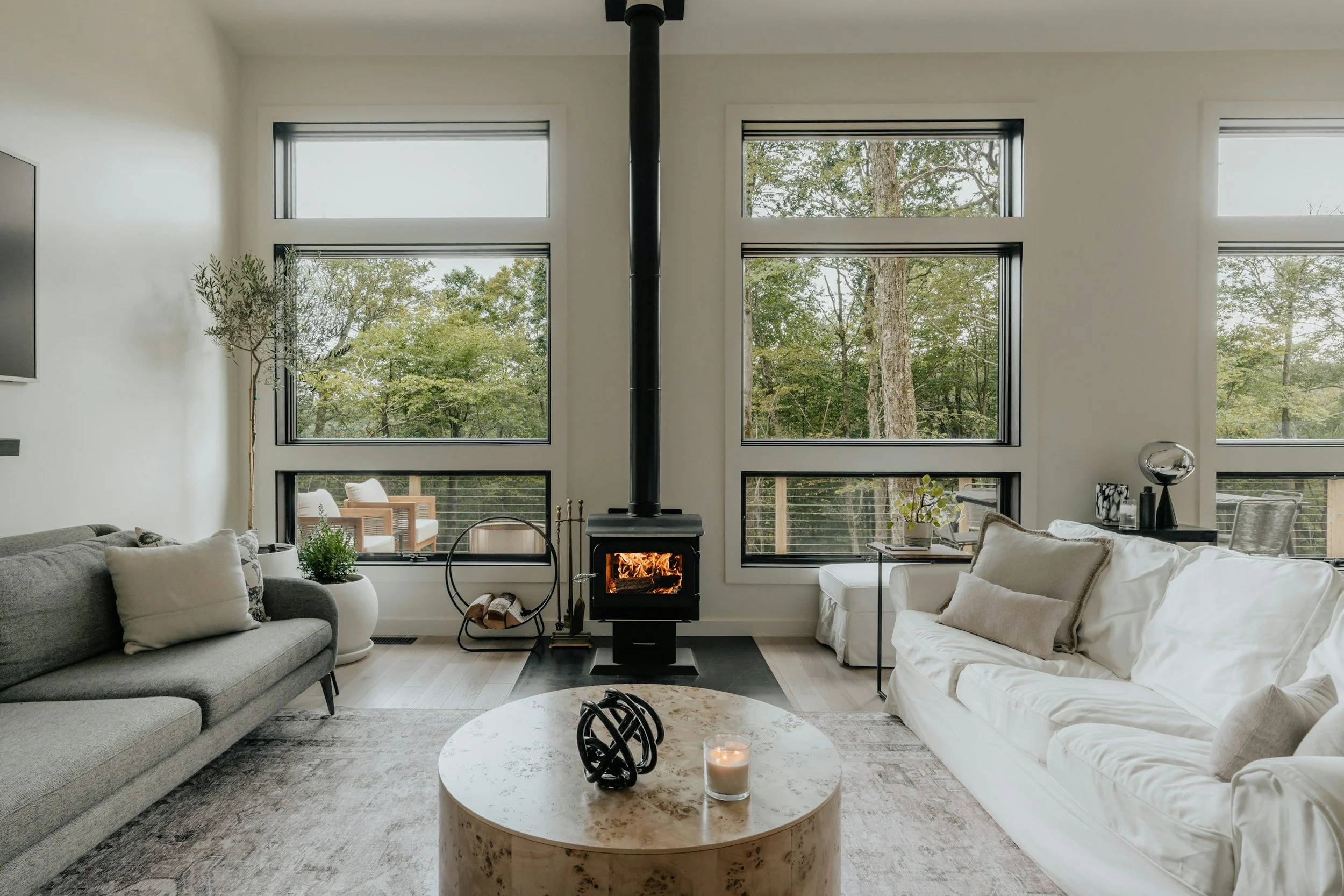living room with gray and white sofas