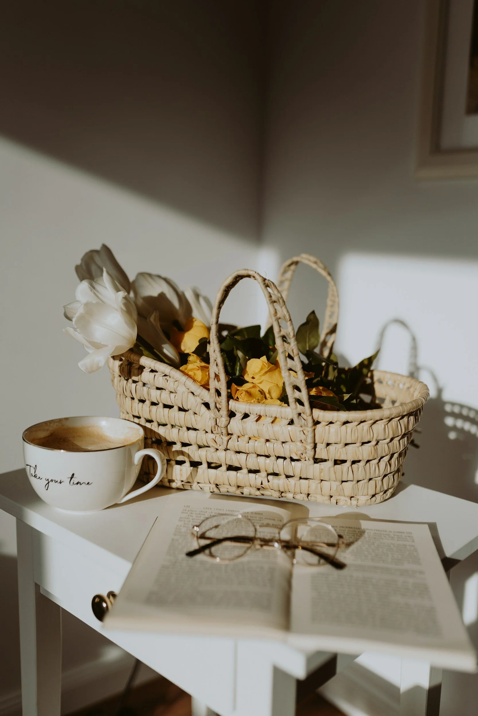 gift basket of flowers with coffee and glasses
