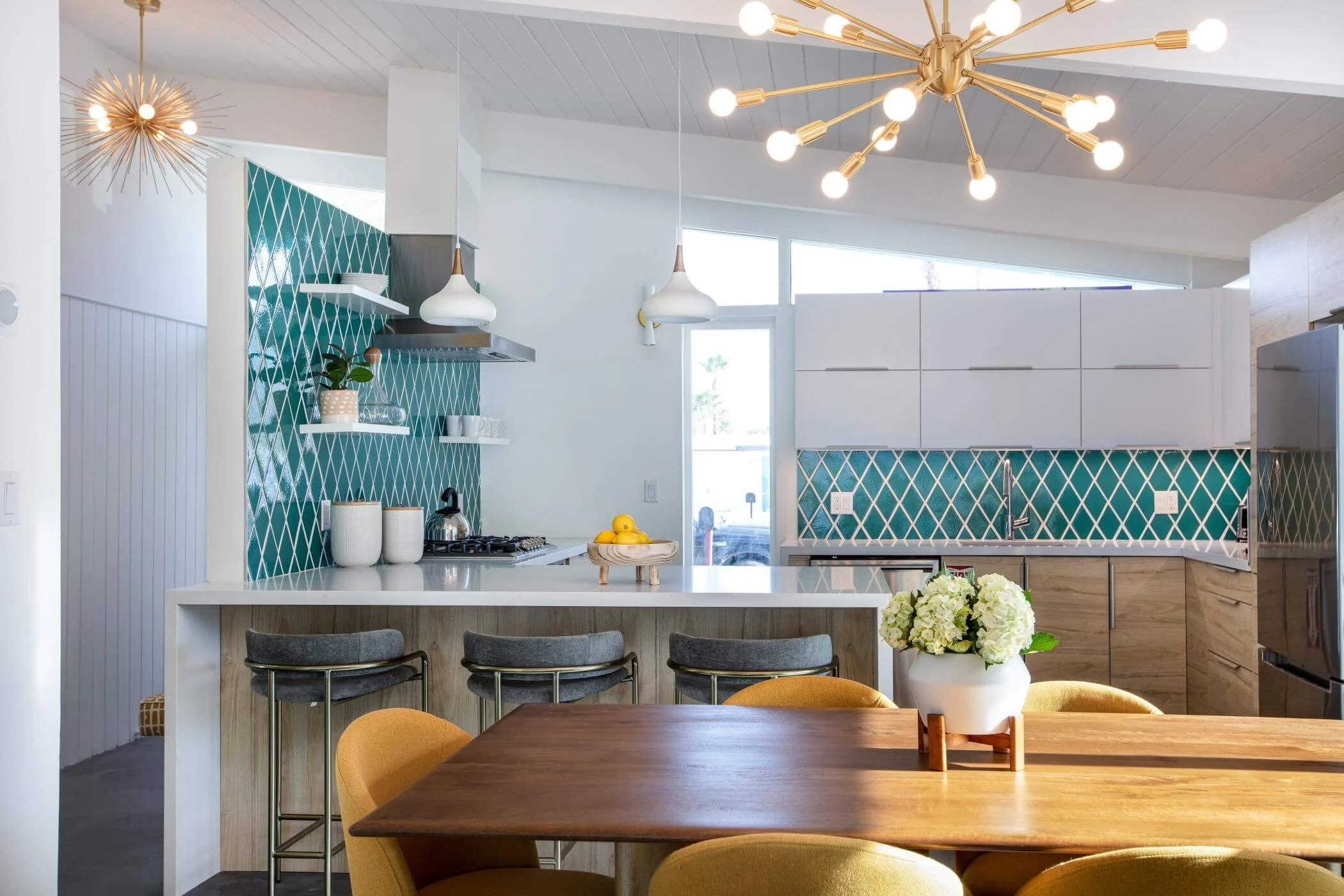 turquoise tile kitchen backsplash with white cabinets 