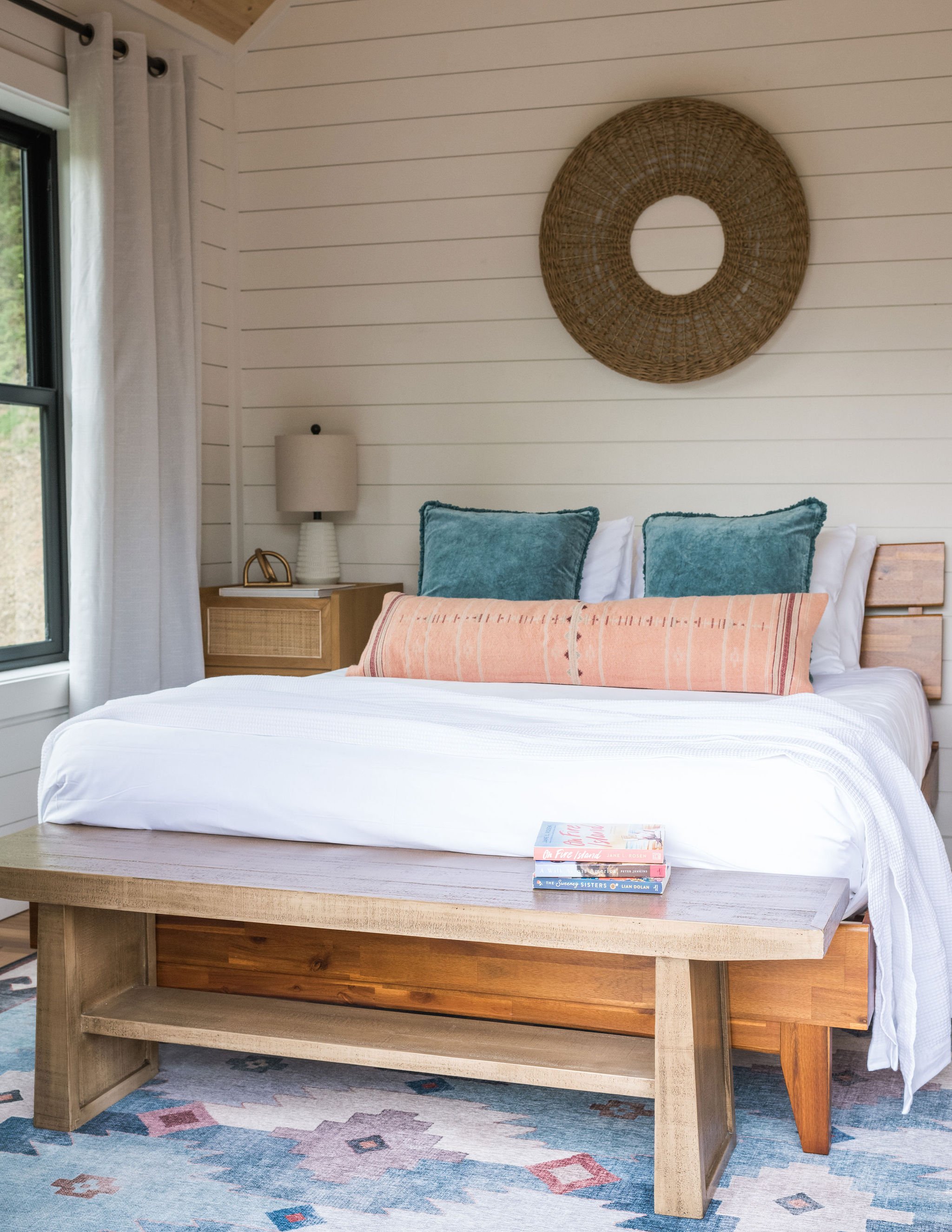 rustic rug and pink lumbar pillow