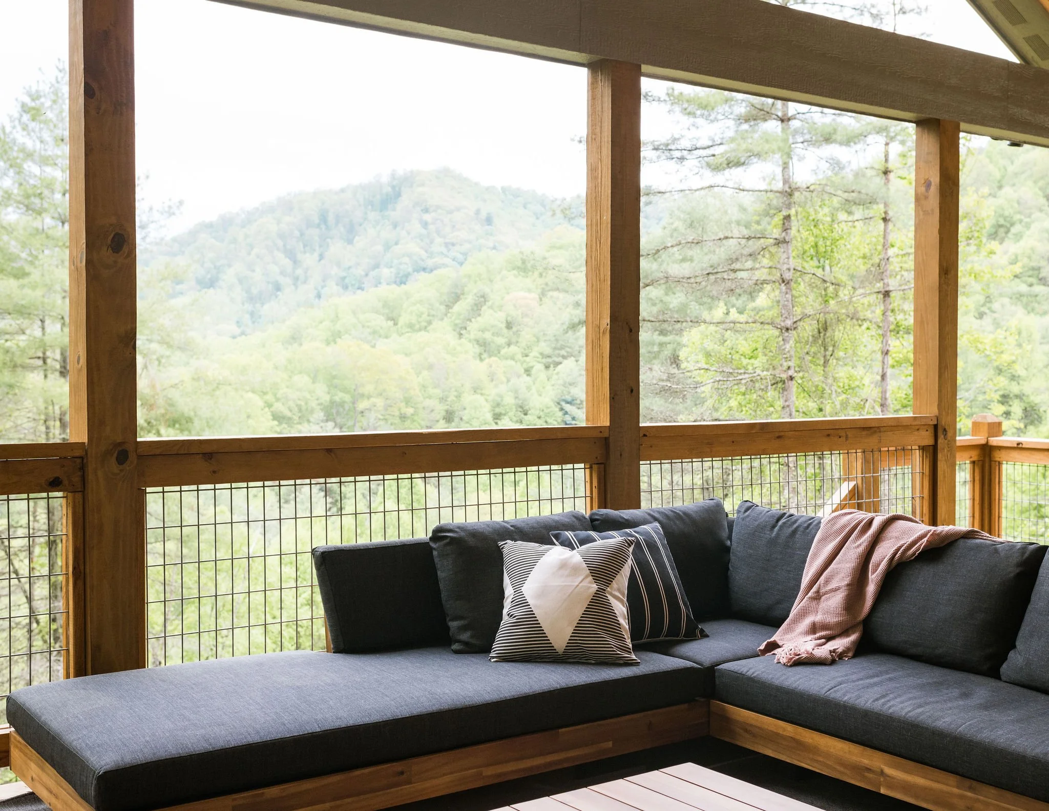 blue sectional sofa with mountain view