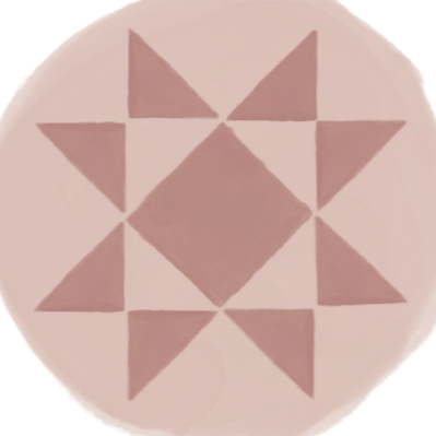 Abstract geometric pattern with triangle and diamond shapes in shades of pink and purple.